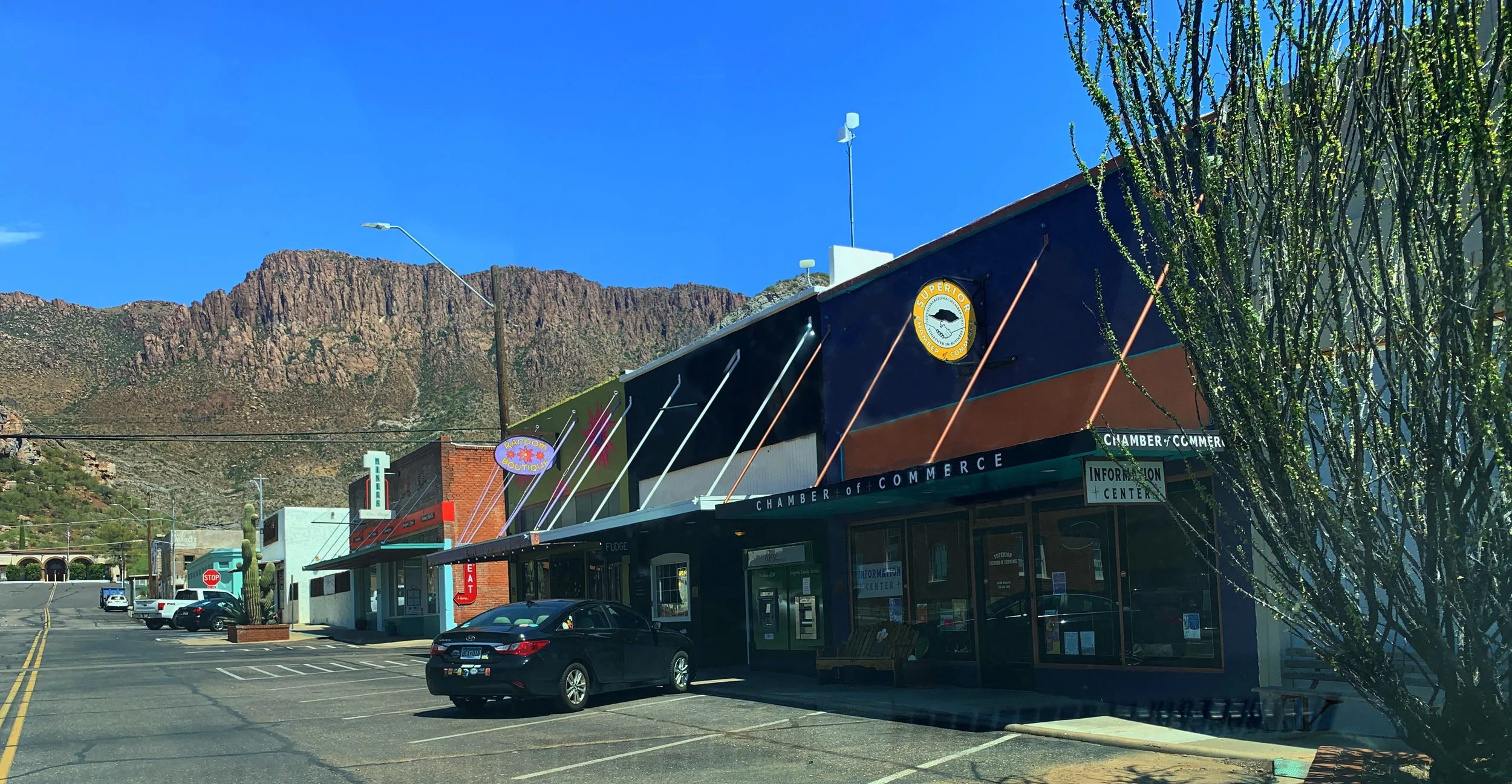 Main Street view of downtown Superior, Arizona with historic buildings.