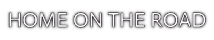 Home on the Road travel graphic with glowing white text on neutral background.