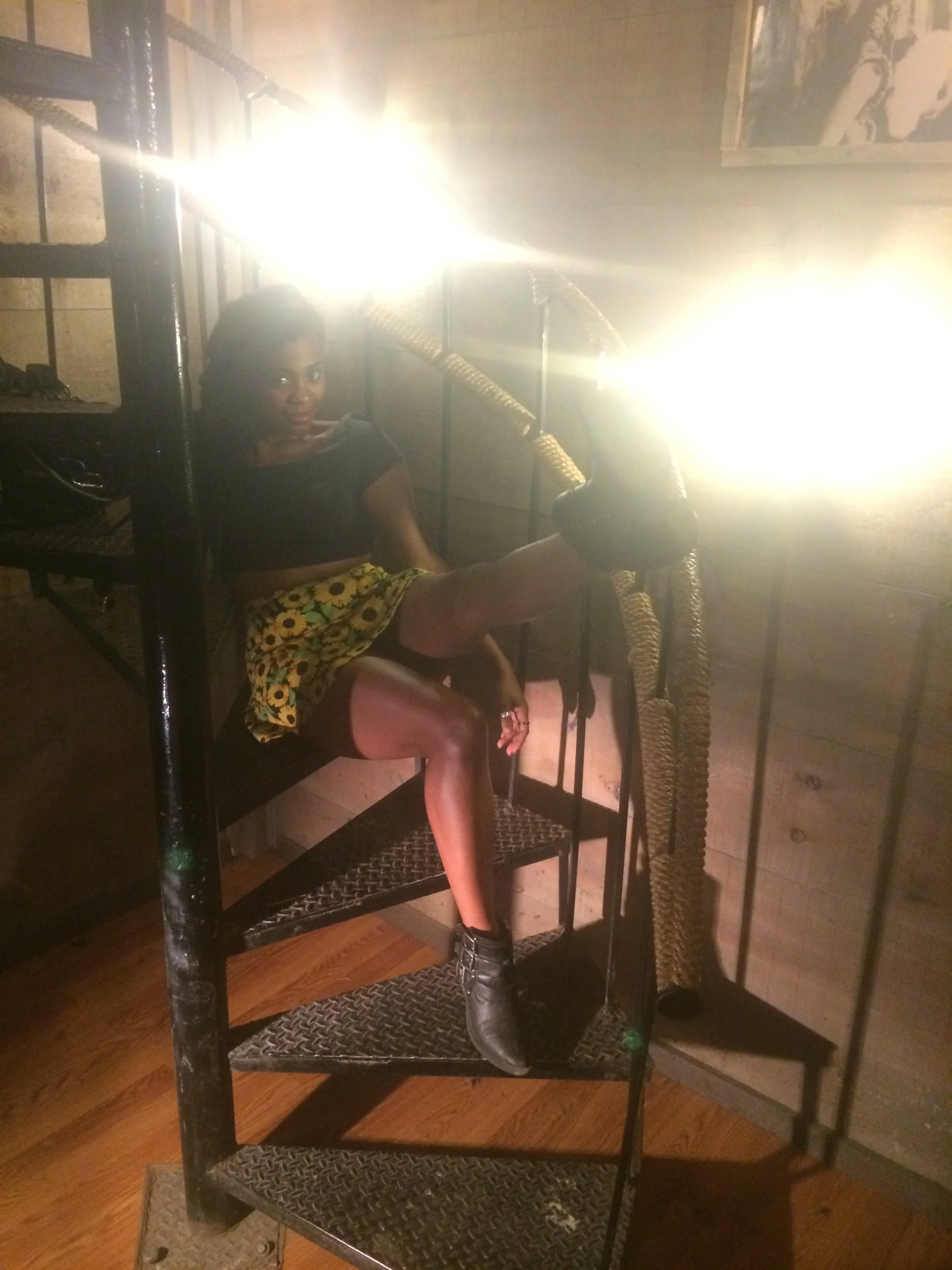 Visitor on the spiral staircase inside Big Nose Kate’s Saloon in Tombstone, Arizona