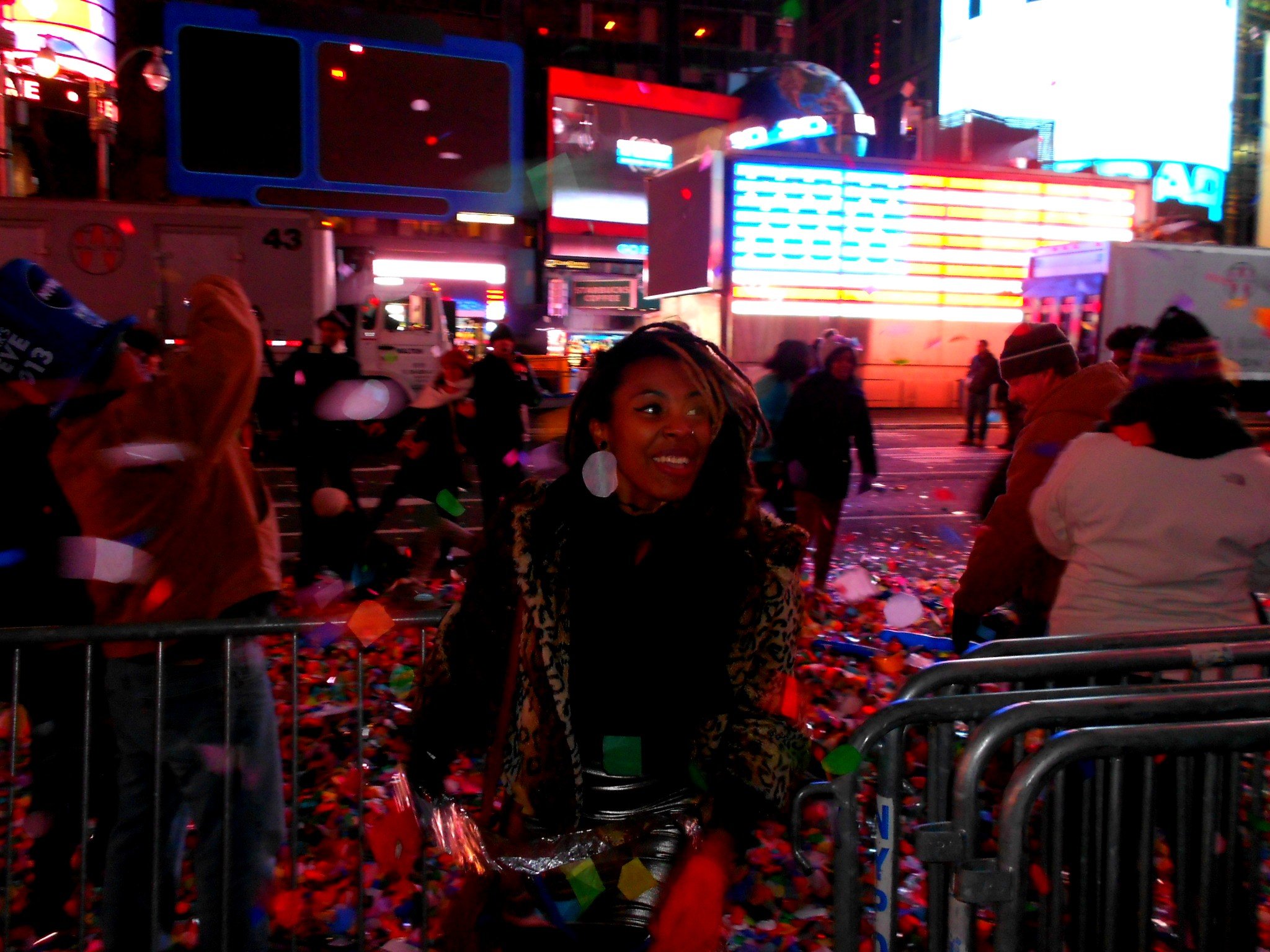 Smiling among falling confetti after midnight in Times Square on New Year's Day 2013.