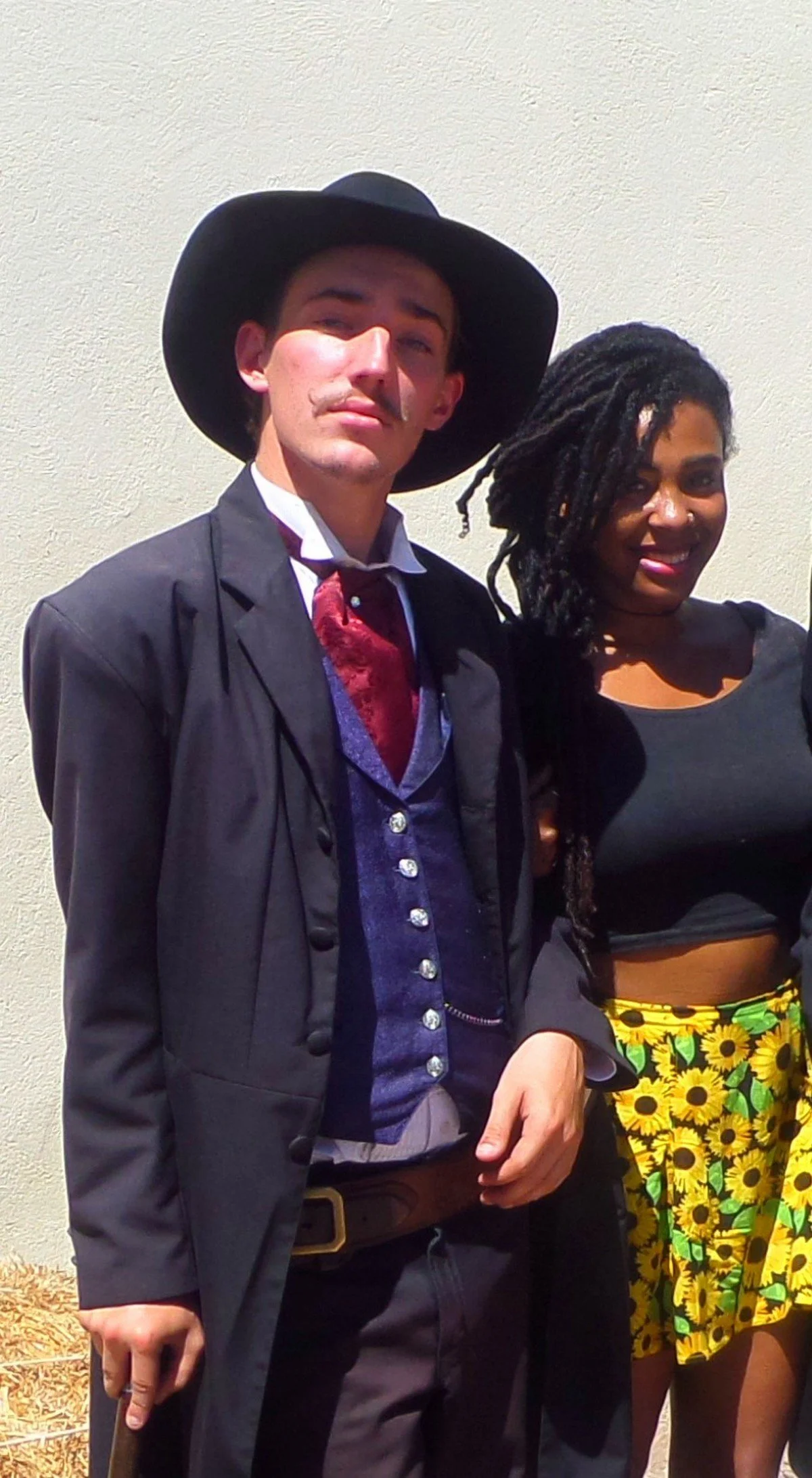 Person photographed with OK Corral reenactment actors in Tombstone, Arizona