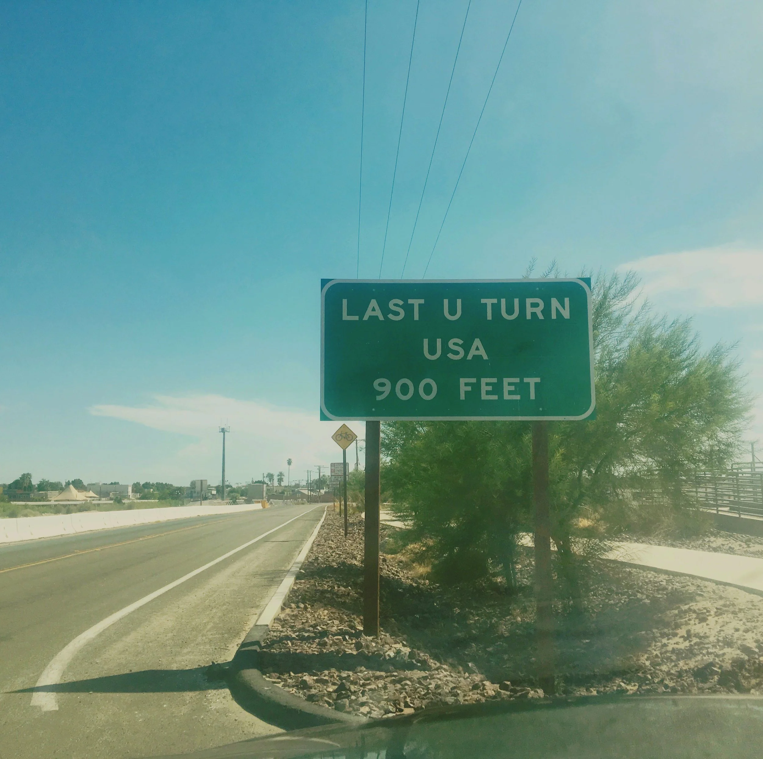 Last U-turn USA sign along a desert highway near Yuma, Arizona close to the Mexico border.