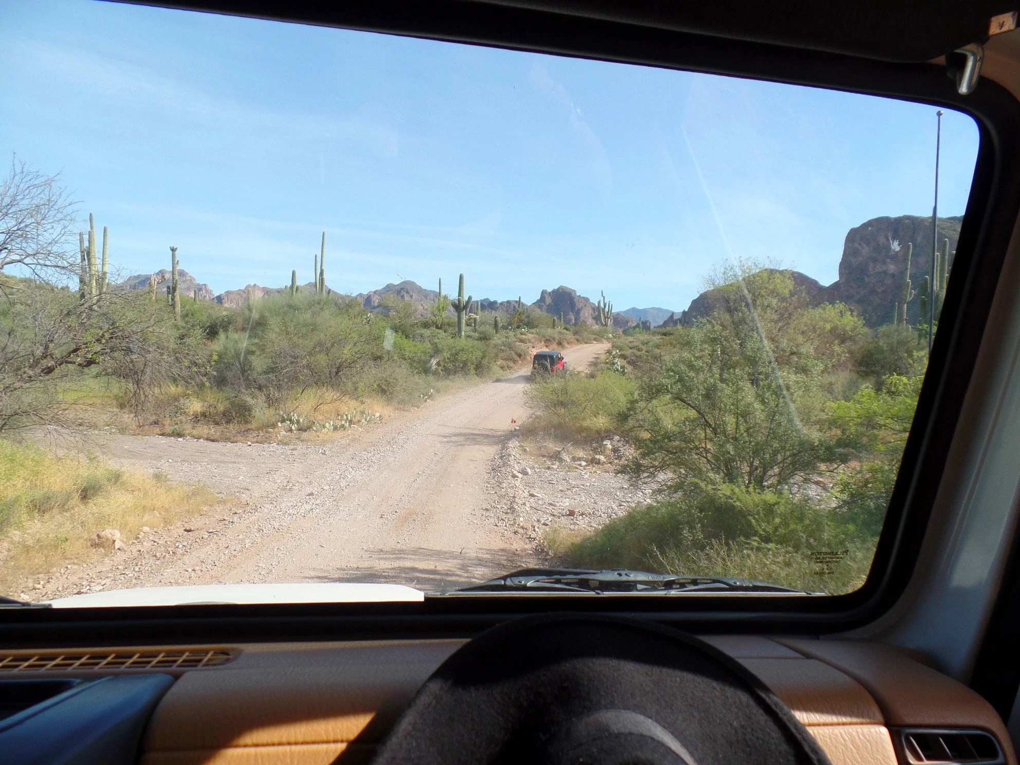 Jeep off-roading on a rugged desert road on Montana Mountain near Queen Valley, Arizona.