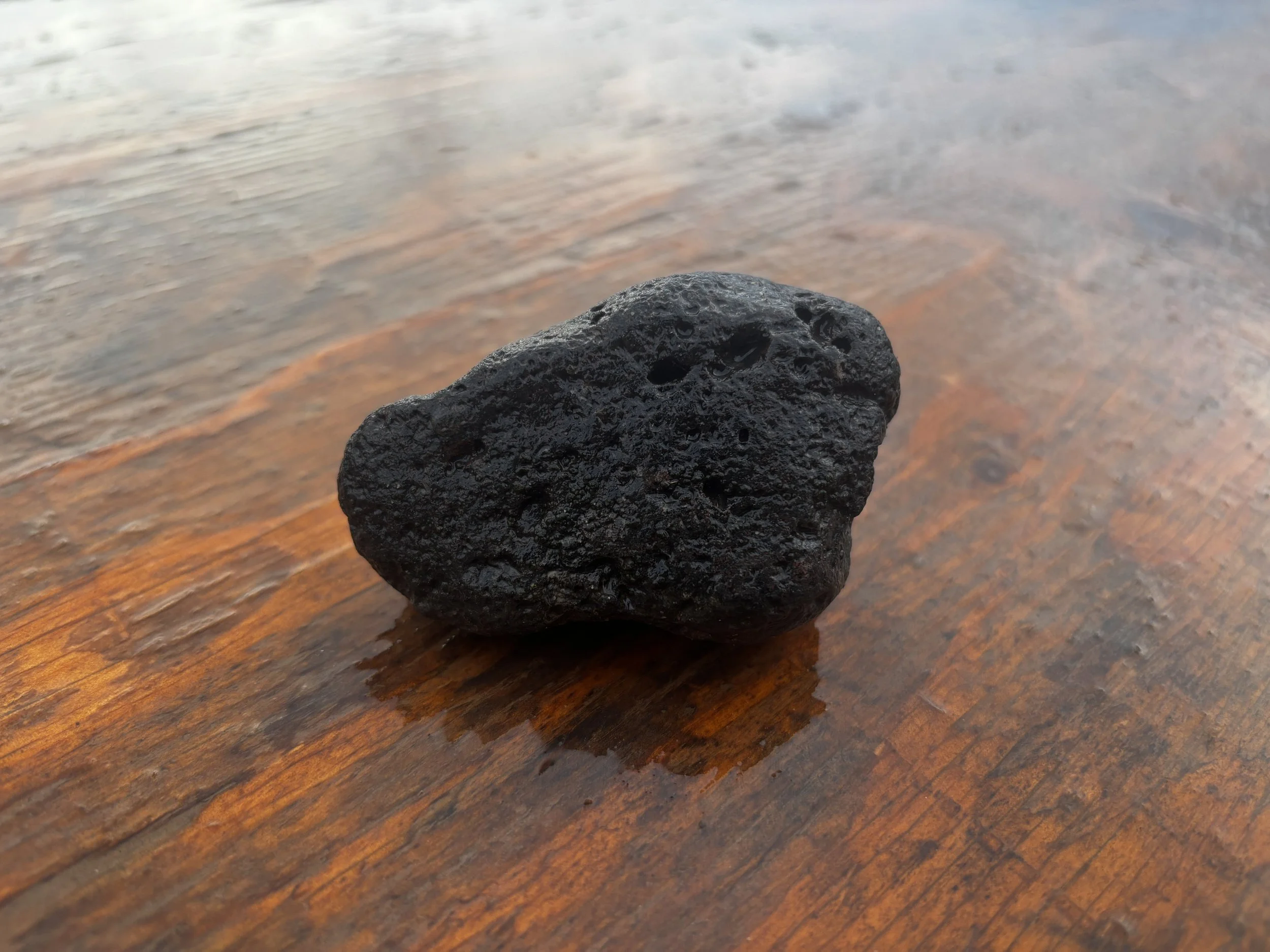 Raw Sonoran Desert lava rock used as a natural grounding stone