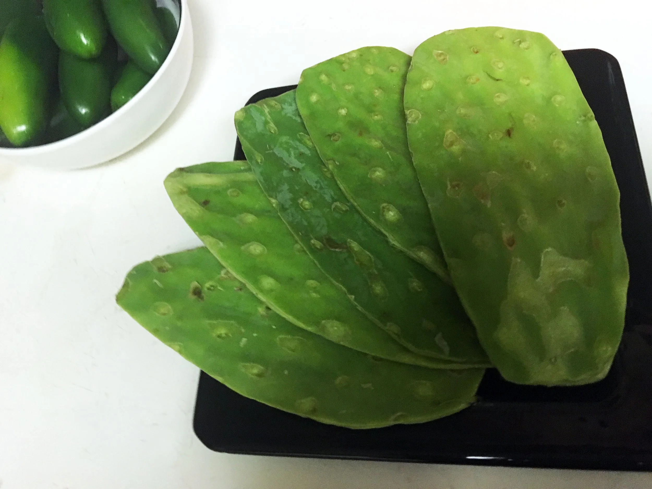 Fresh nopal cactus paddle prepared for cooking and use in cactus recipes.