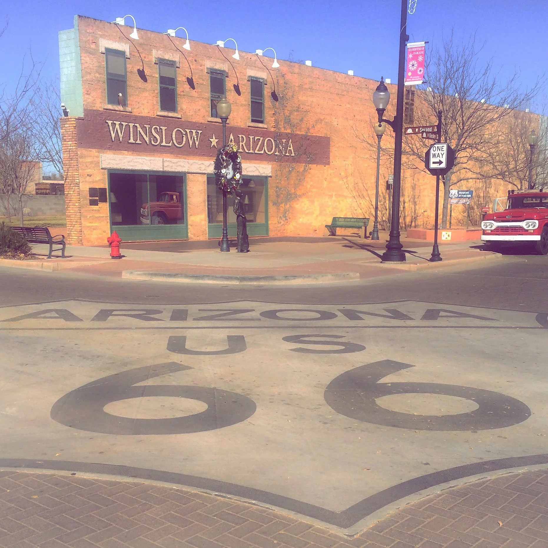 Painted Route 66 road emblem in downtown Winslow, Arizona.