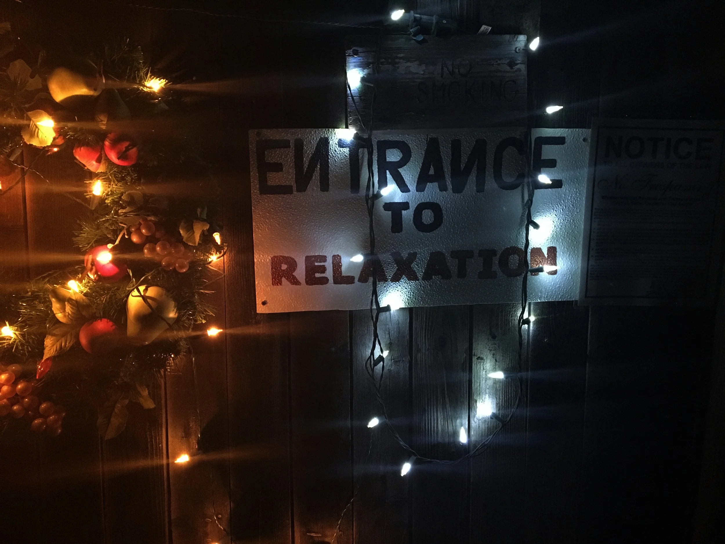 Sign reading “Entrance to Relaxation” at El Dorado Hot Springs in Arizona.