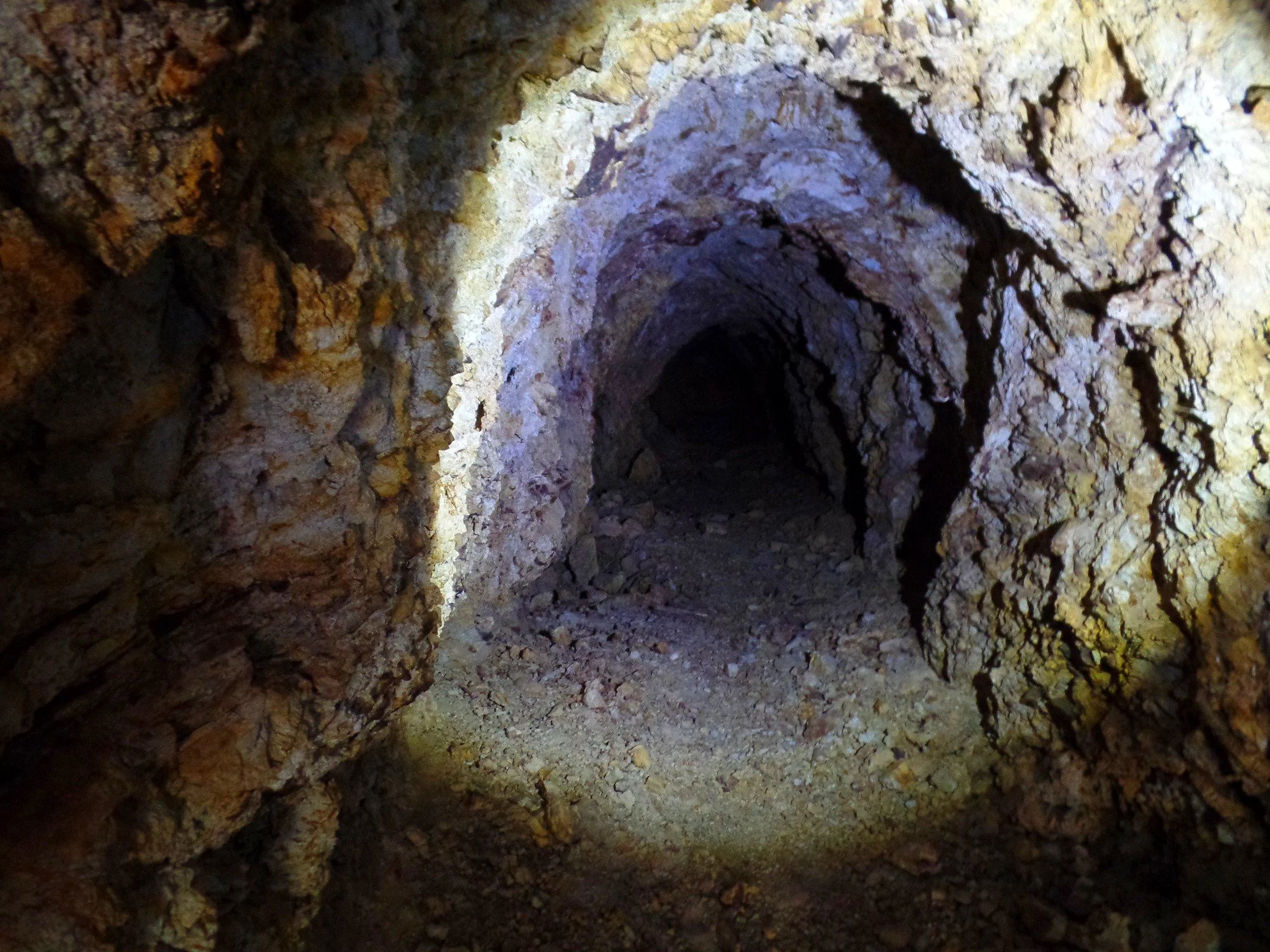 Natural cave opening in the rocky cliffs along Montana Mountain in Arizona.