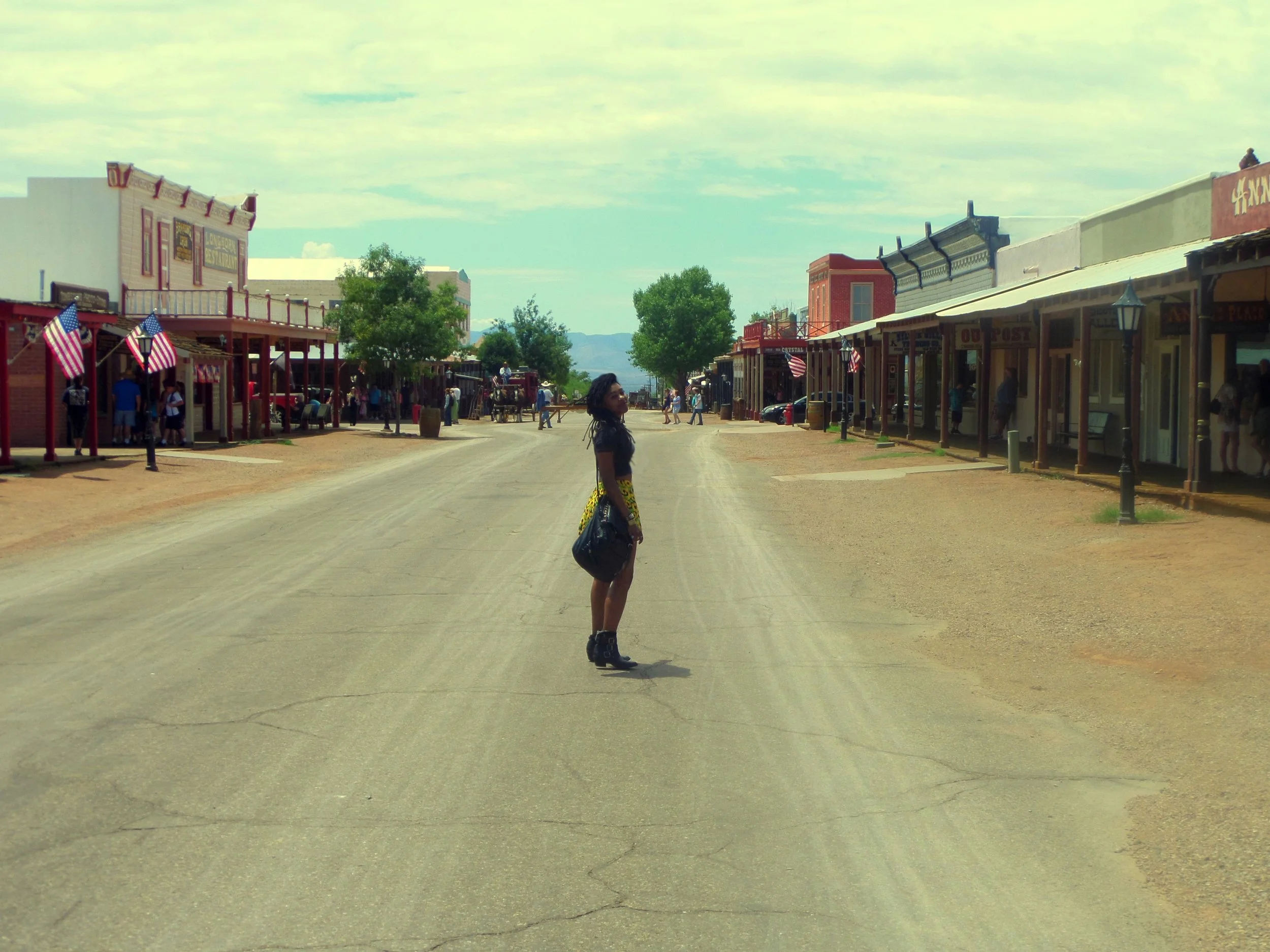 Main street in Tombstone, Arizona with wooden boardwalks and Old West storefronts