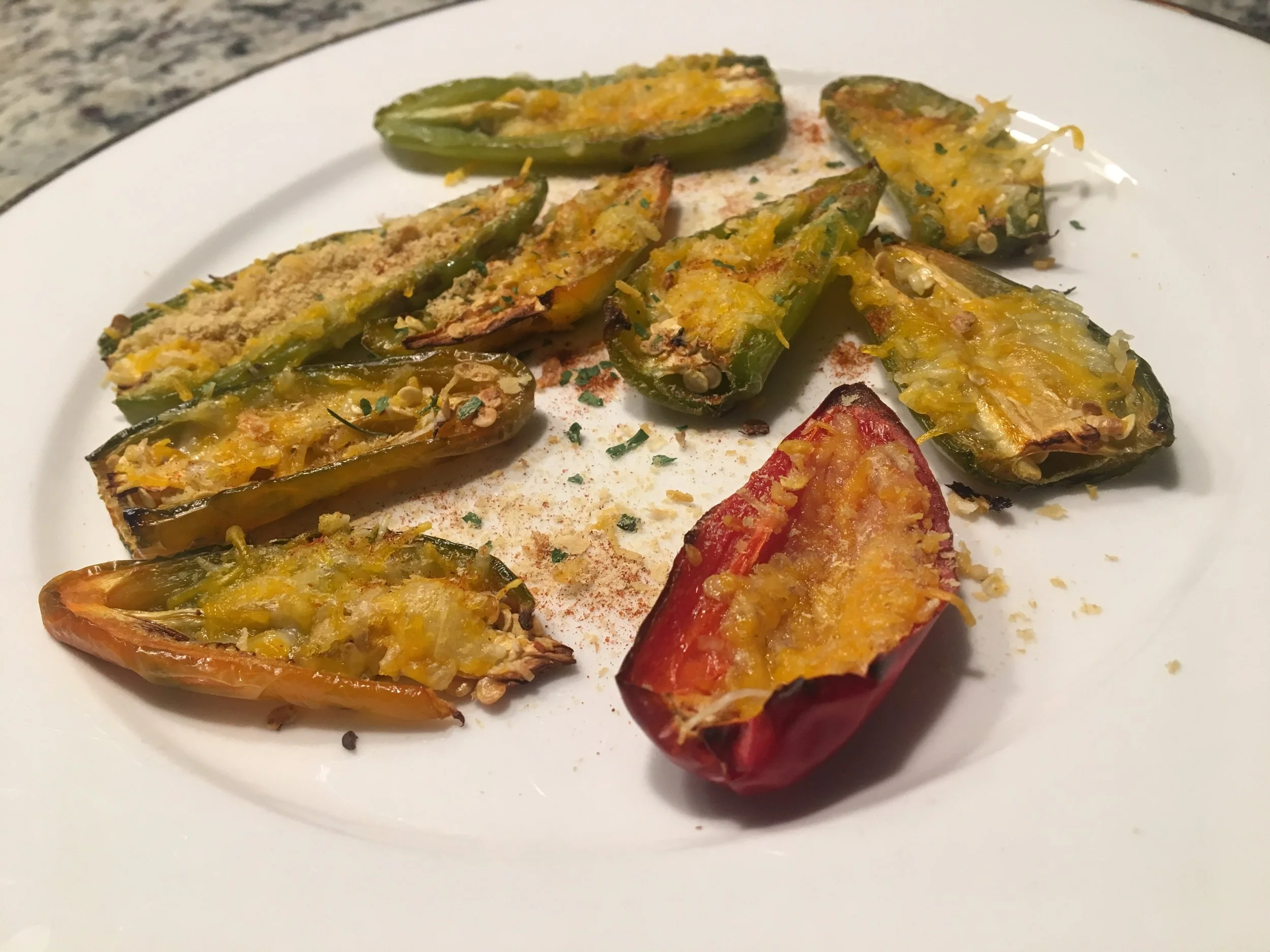 Roasted jalapeño and Fresno peppers topped with melted vegan cheese and Southwest-inspired seasonings.
