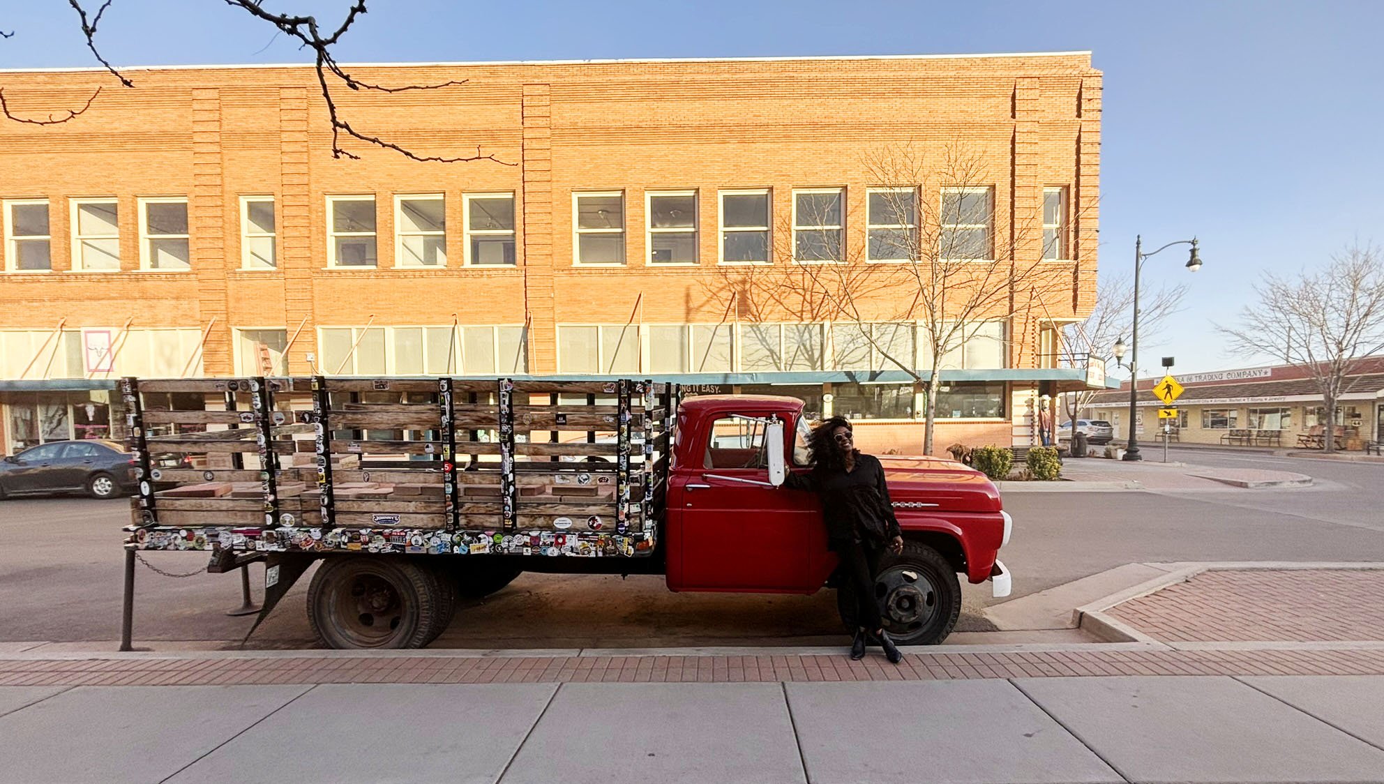 The iconic red Ford truck display behind the Winslow Arizona mural.