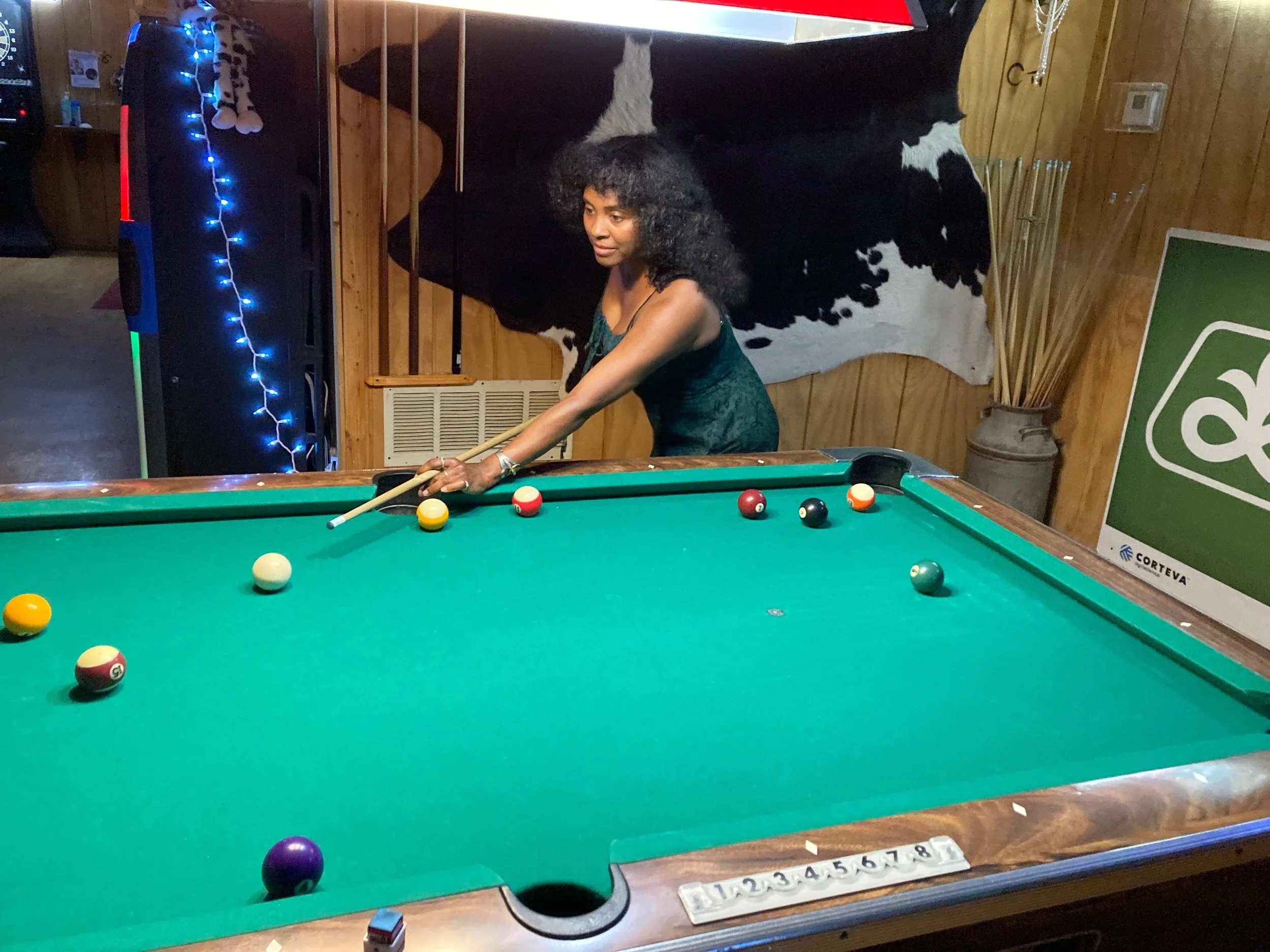 Playing pool at Cowtown Tavern in Stanfield, Arizona, a local watering hole along Highway 84.