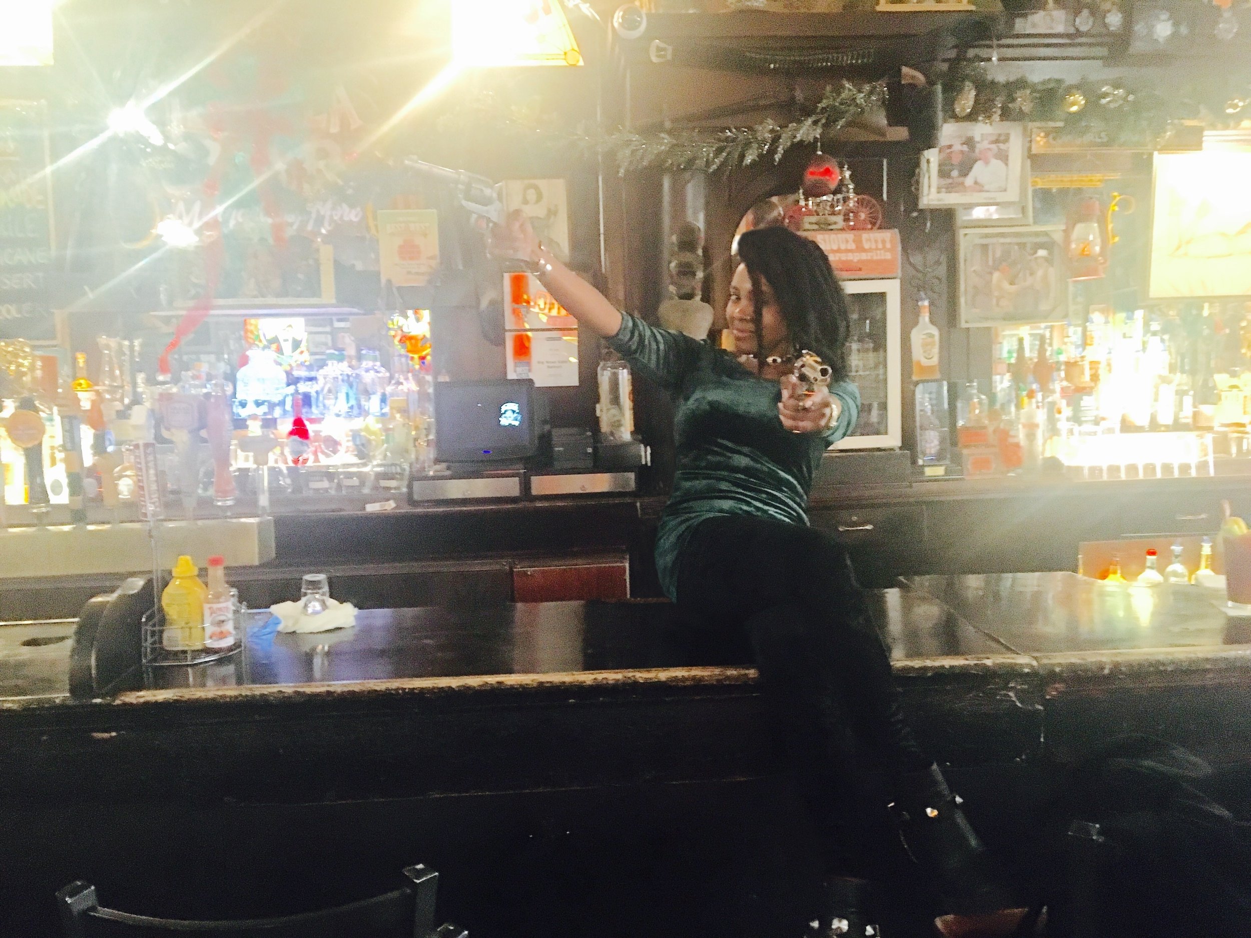 The author casually posing with replica pistols inside Big Nose Kate’s Saloon in Tombstone, Arizona