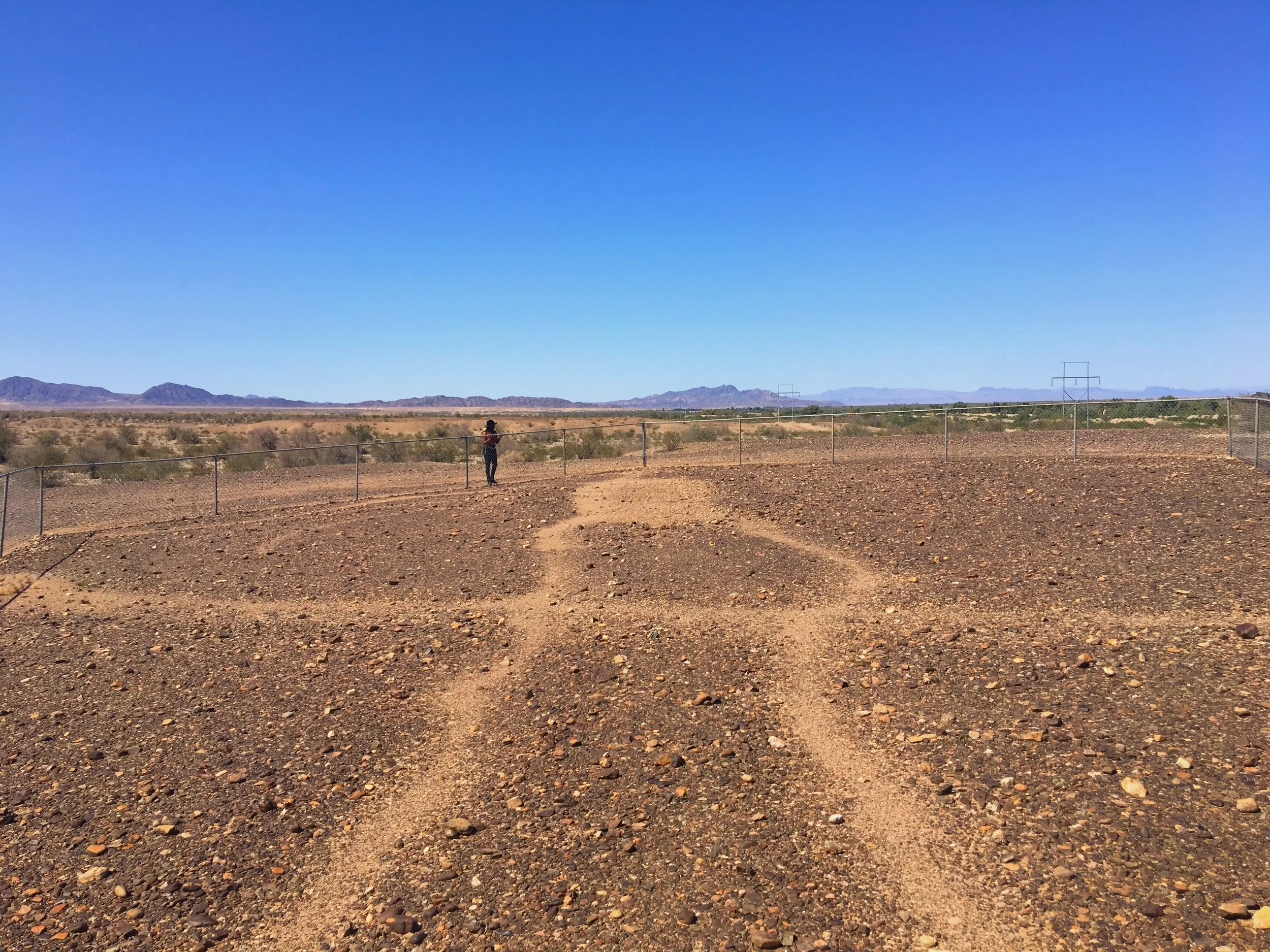 Giant human-shaped geoglyph at the Blythe Intaglios in California carved into Colorado Desert soil.