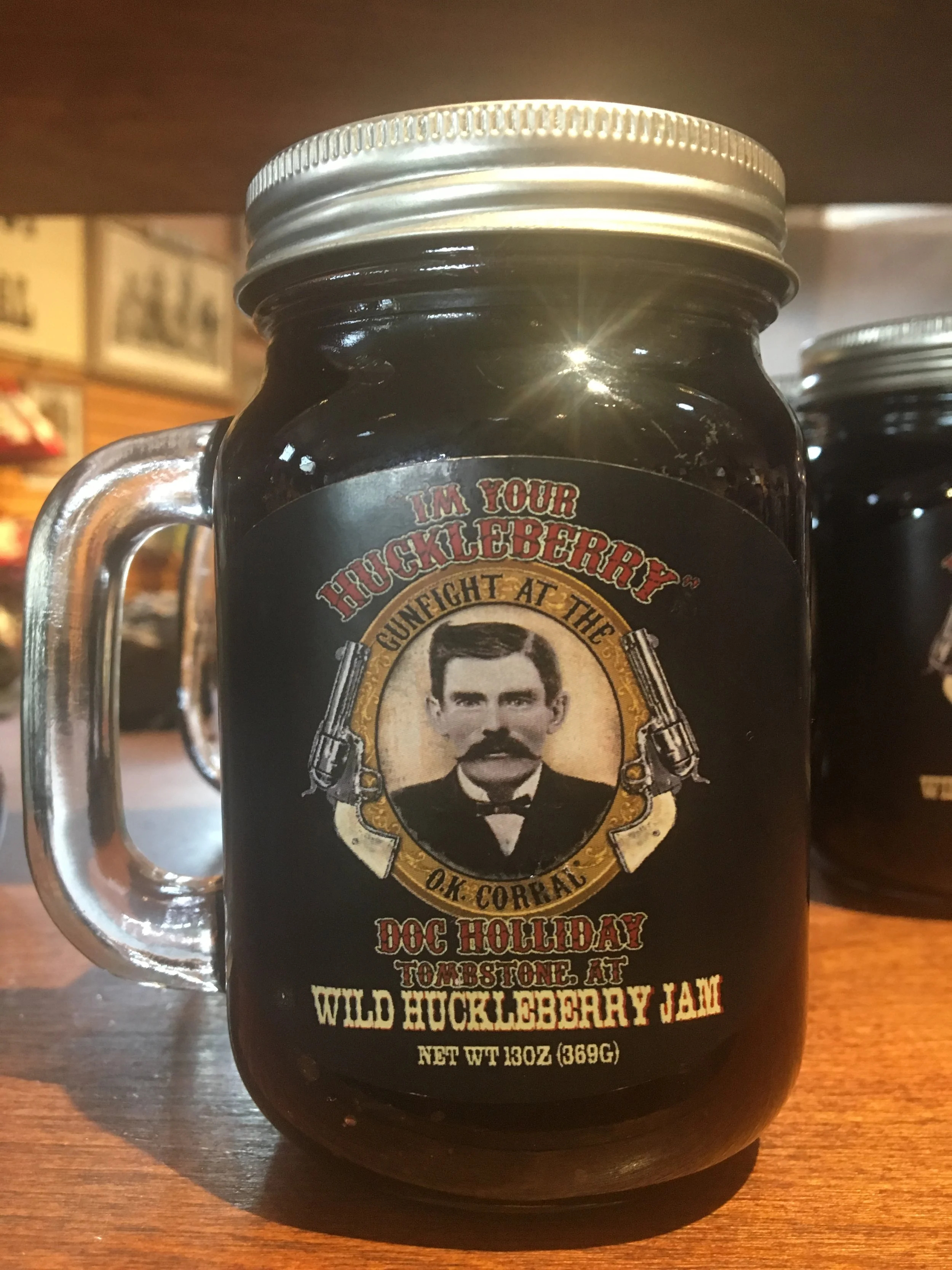 A jar of Doc Holliday–themed jam displayed in Tombstone, Arizona, referencing the Old West legend