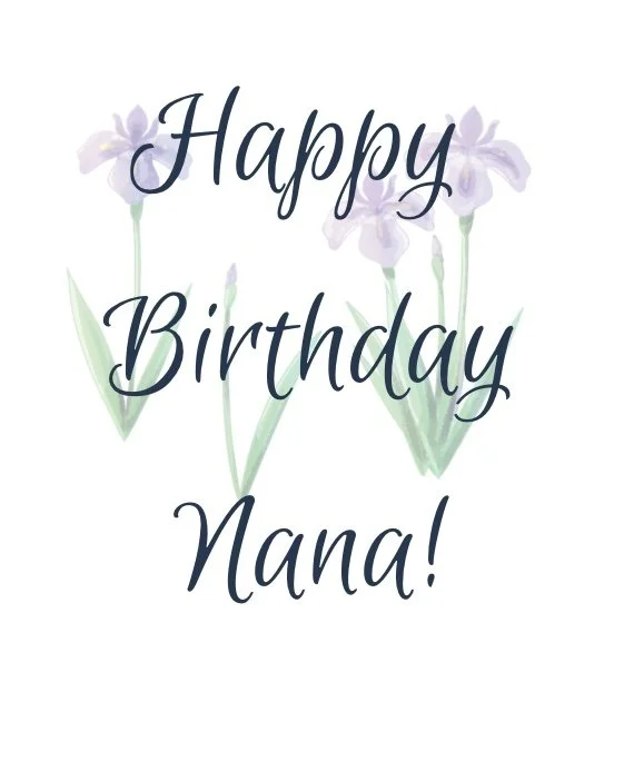 A birthday card with the message "Happy Birthday Nana!" in elegant dark script, decorated with light purple irises in the background.