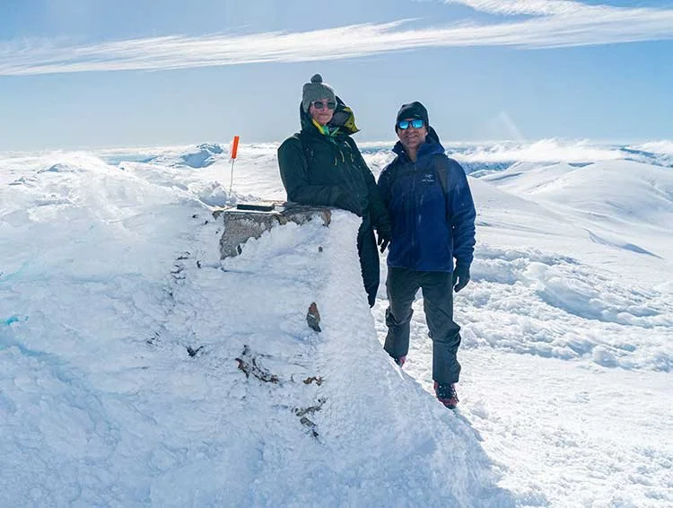 At the Mt Kosciuszko marker on a clear winter day
