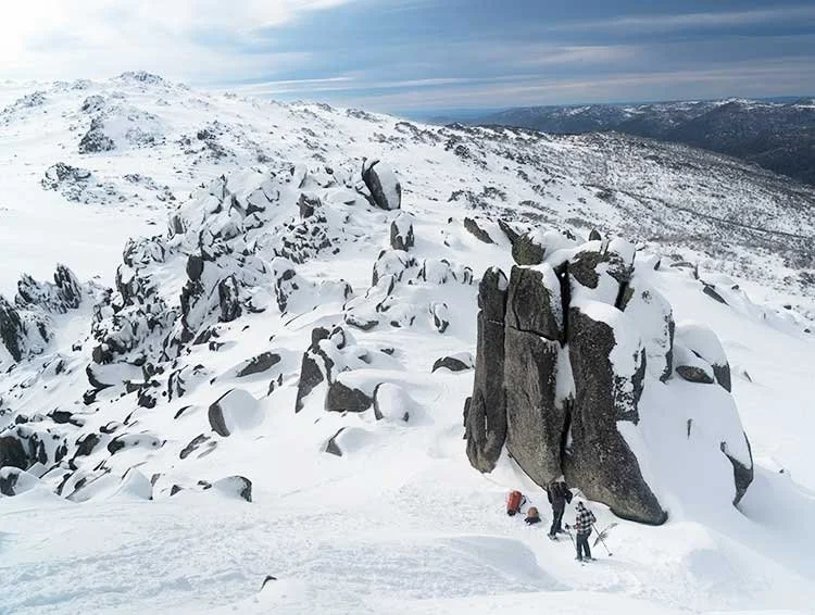 Snowshoers below the granite tors of South Ramshead