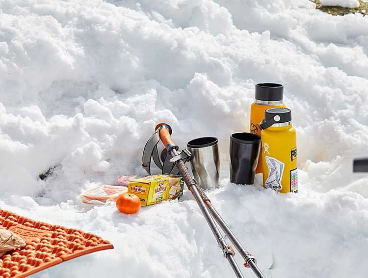 A snack stop in the snow on a K7 snowshoe tour