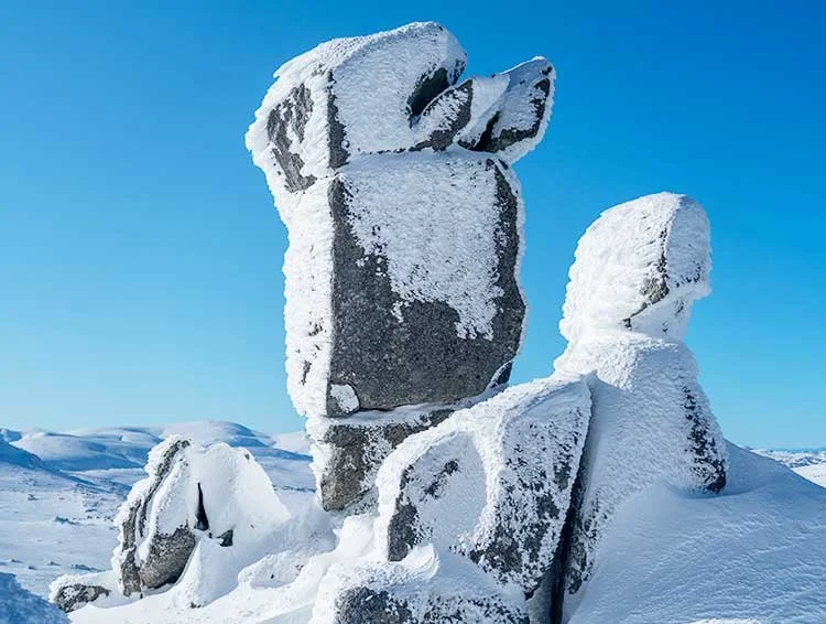 Granite tors in the Ramshead Range under blue sky