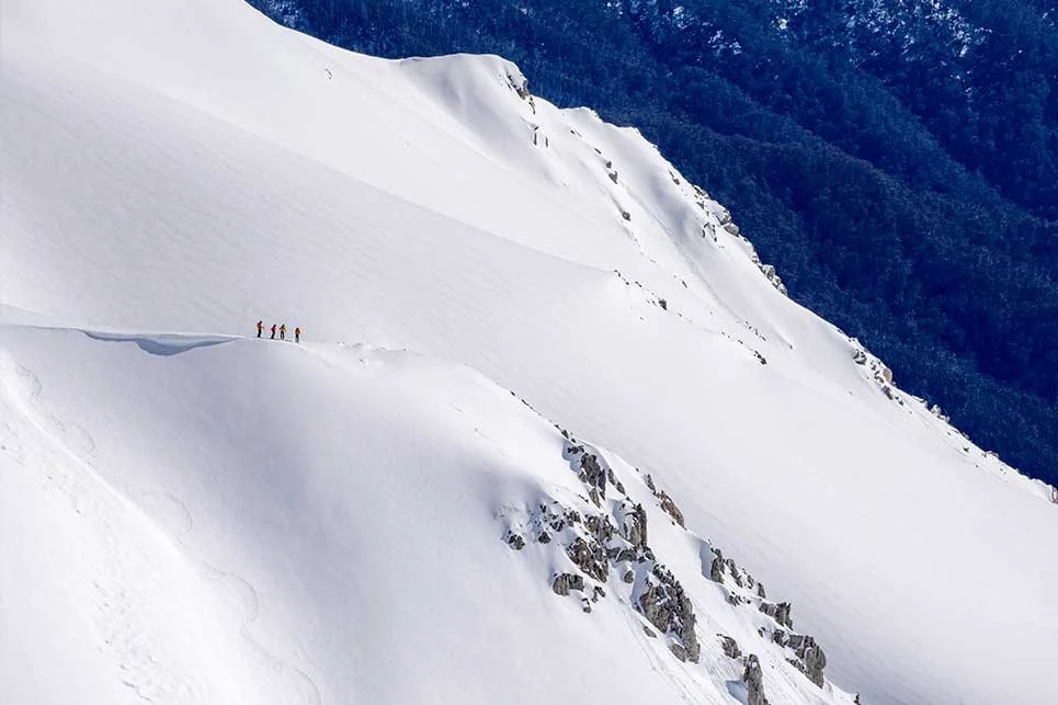 Skiing the long lines of the Western Faces