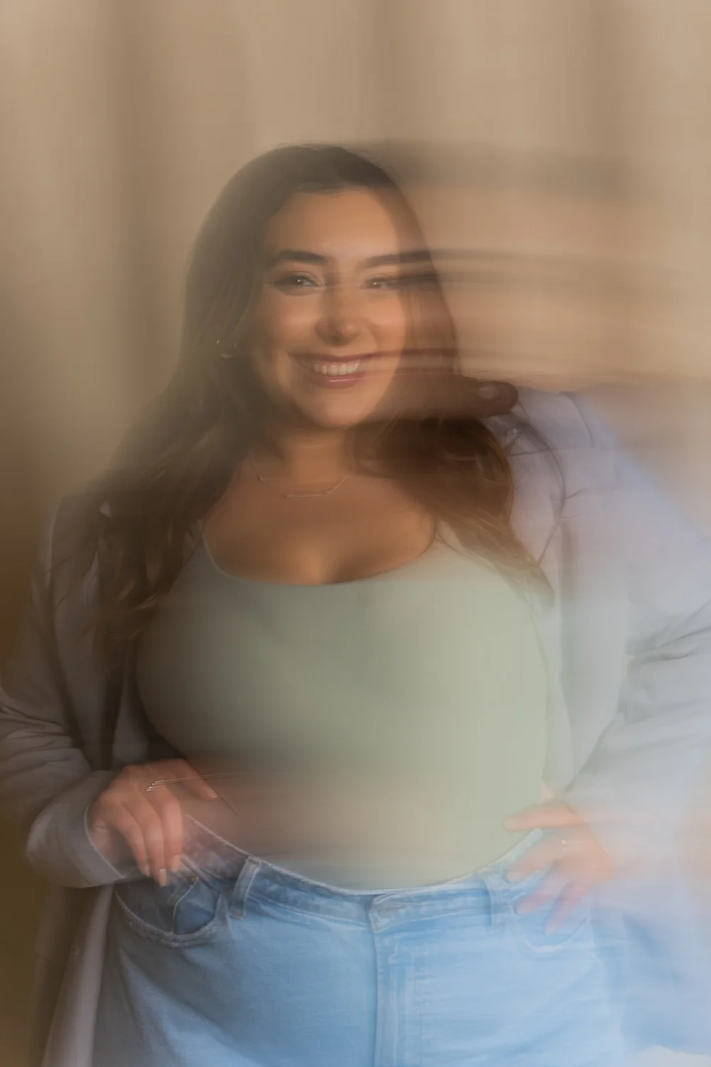 Avita laughing, caught in motion