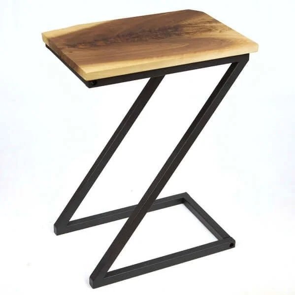 A modern side table with a wooden top and black Z-shaped metal frame.