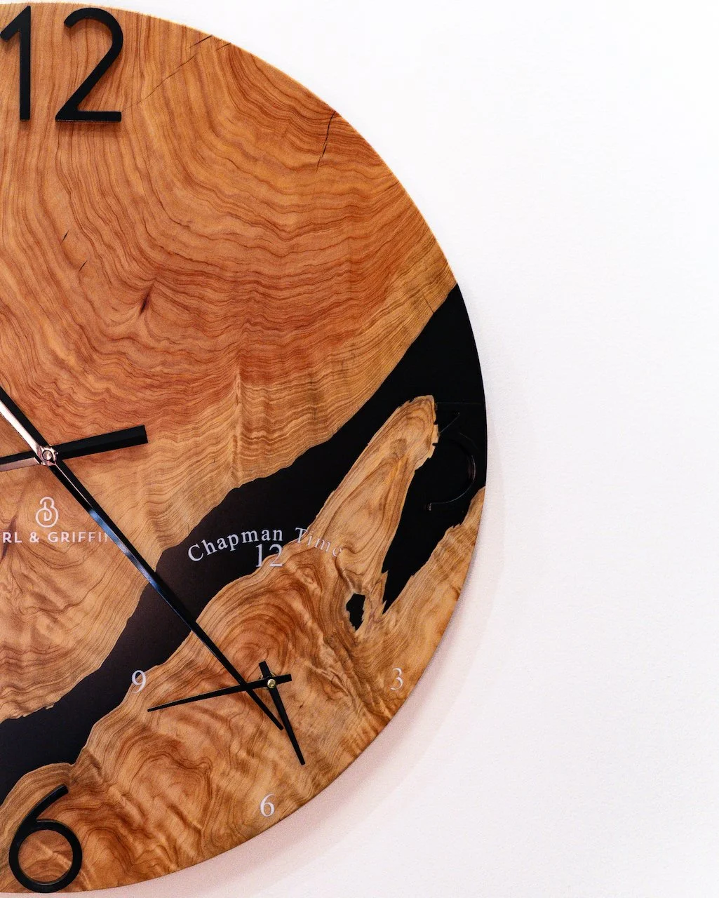 Detailed grain of Australian Cypress Pine in a handmade 60cm wall clock.