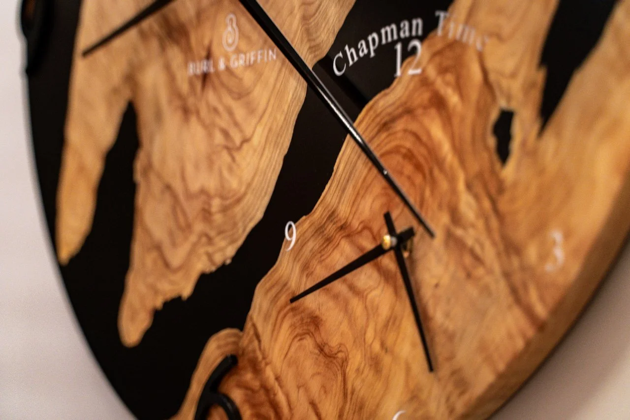 Intricate Cypress Pine figuring around the central hands of the Dual Clock.