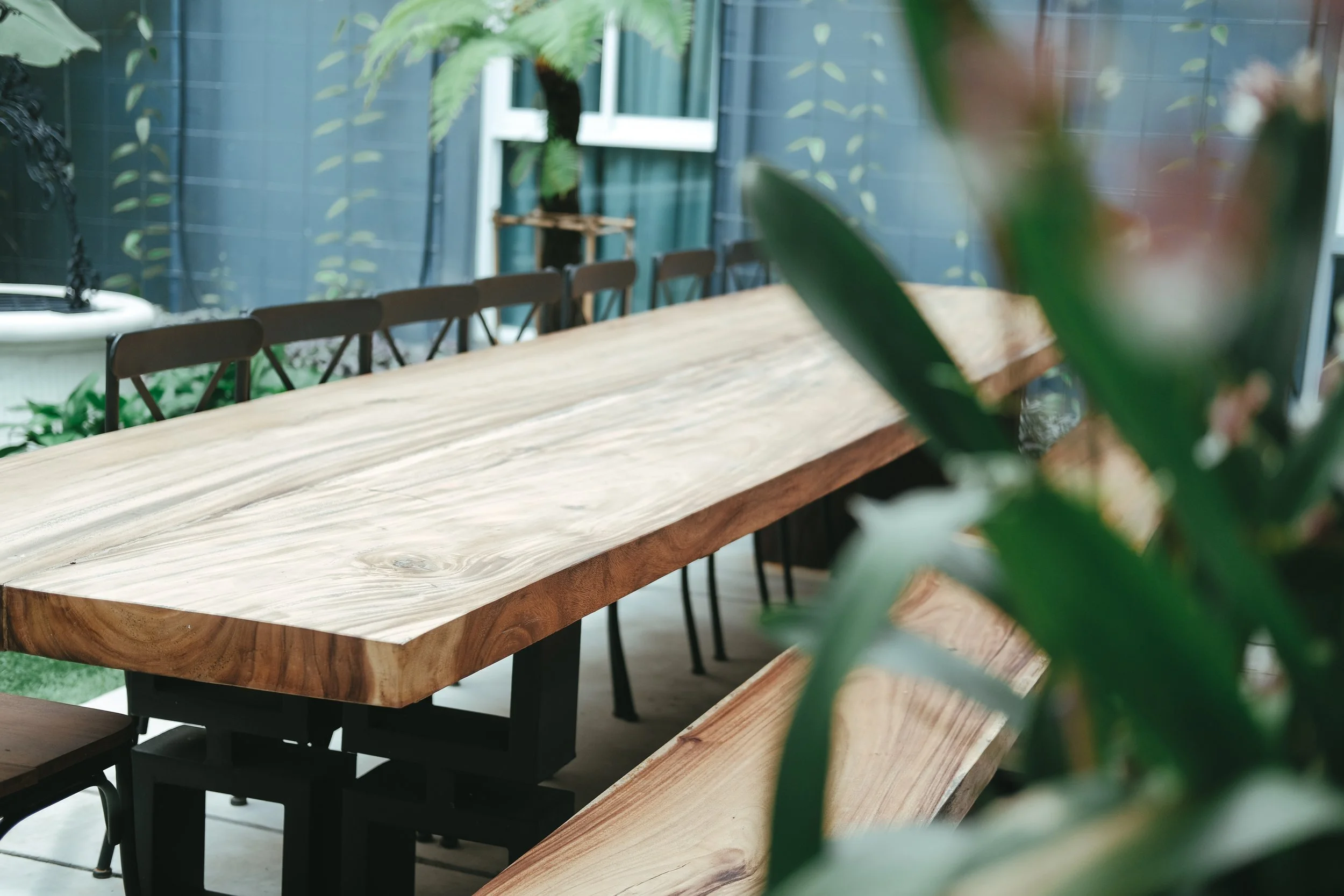 Bespoke timber slab boardroom style table by Burl & Griffin