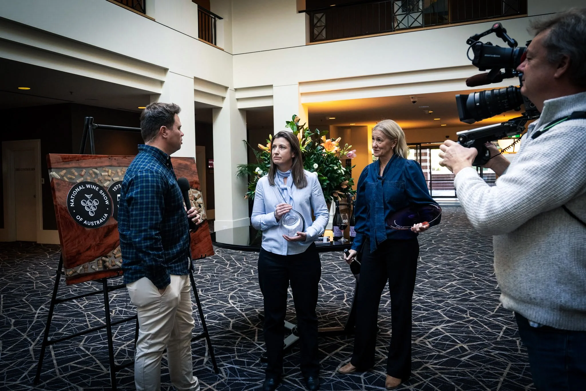 Winners of the Australian National Wine Show 2025 pictured with the bespoke Burl & Griffin cork-inlay trophy board.