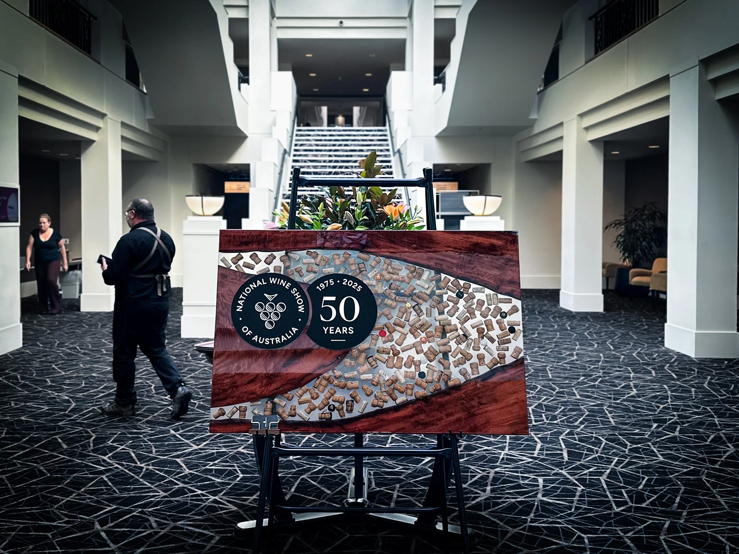 Custom resin and timber display board for the Australian National Wine Show 2025 at the Hyatt Canberra.
