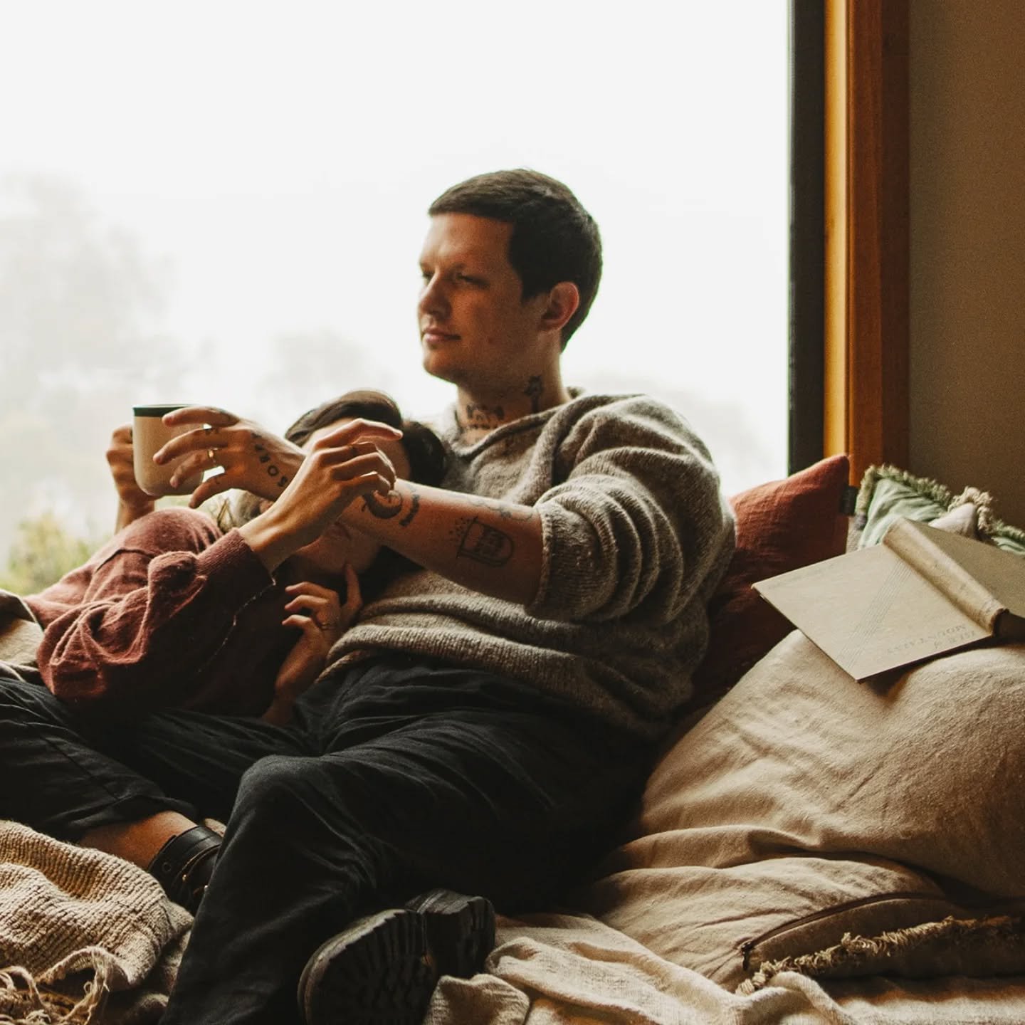 Rain on the roof. Steam rising from the hot tub. A foggy valley stretching into the distance. A loved one's embrace. 
This is what slow living looks like at Orchards Nest Tasmania 🍎🌧️

Wrapped in a blanket on the daybed with a book&hellip; or soaki