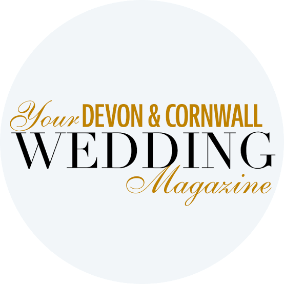 Logo for Your Devon & Cornwall Wedding Magazine featuring elegant black, gold, and cursive text on a light background.