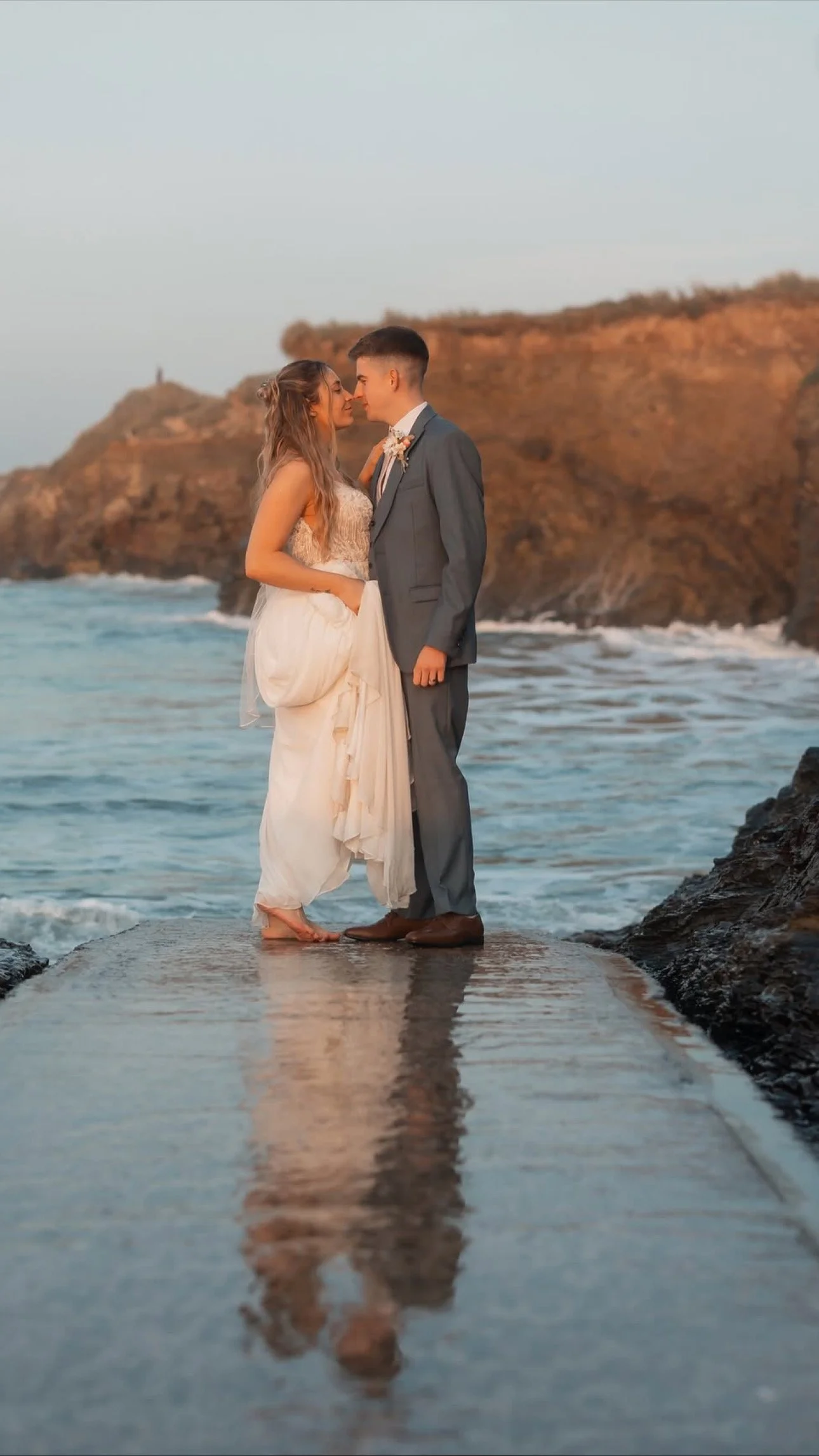 Bride at beach in Cornwall, gwithian, Tom frost photographer