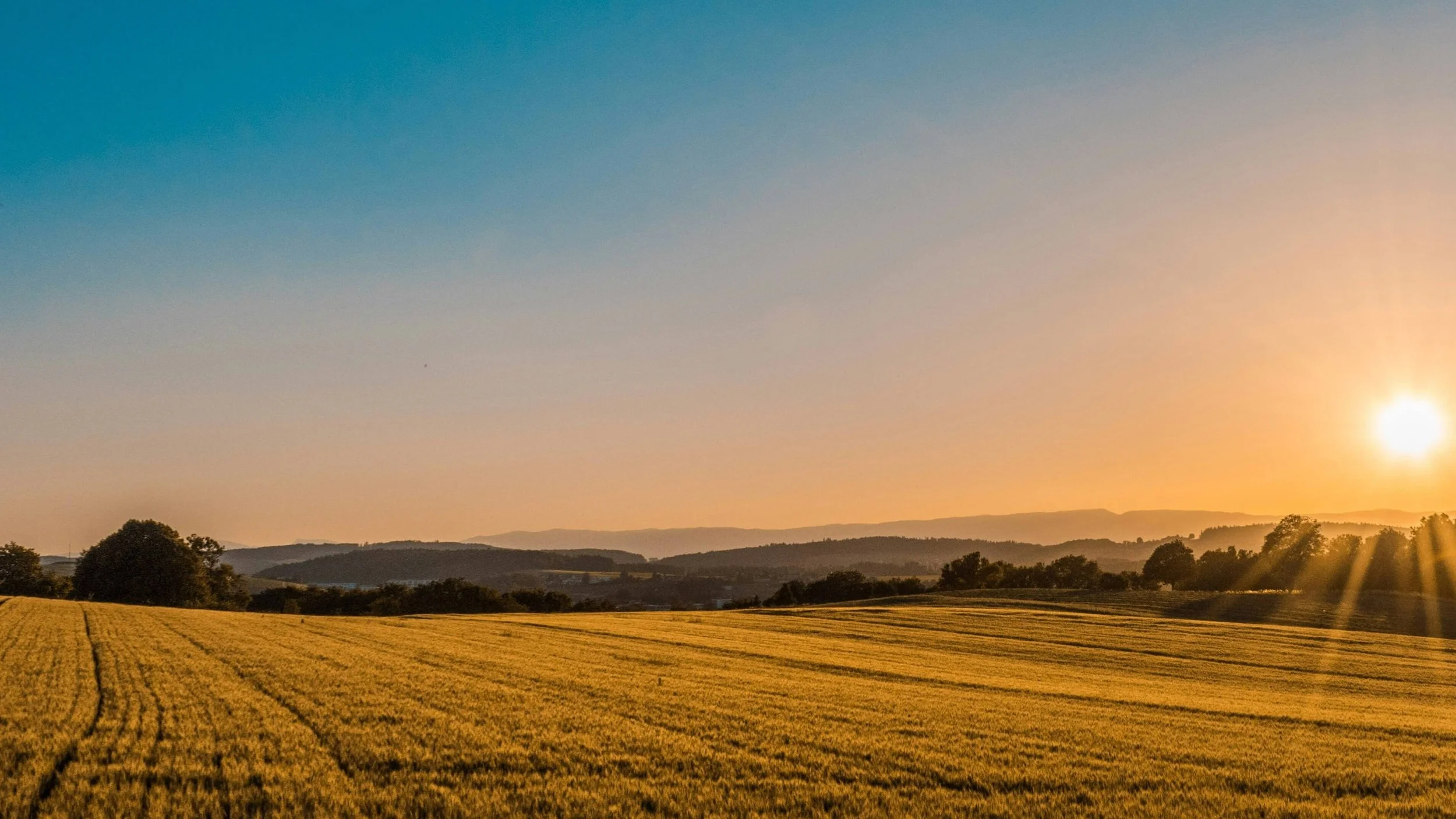 Peaceful rural landscape symbolizing long-term wealth management and retirement planning