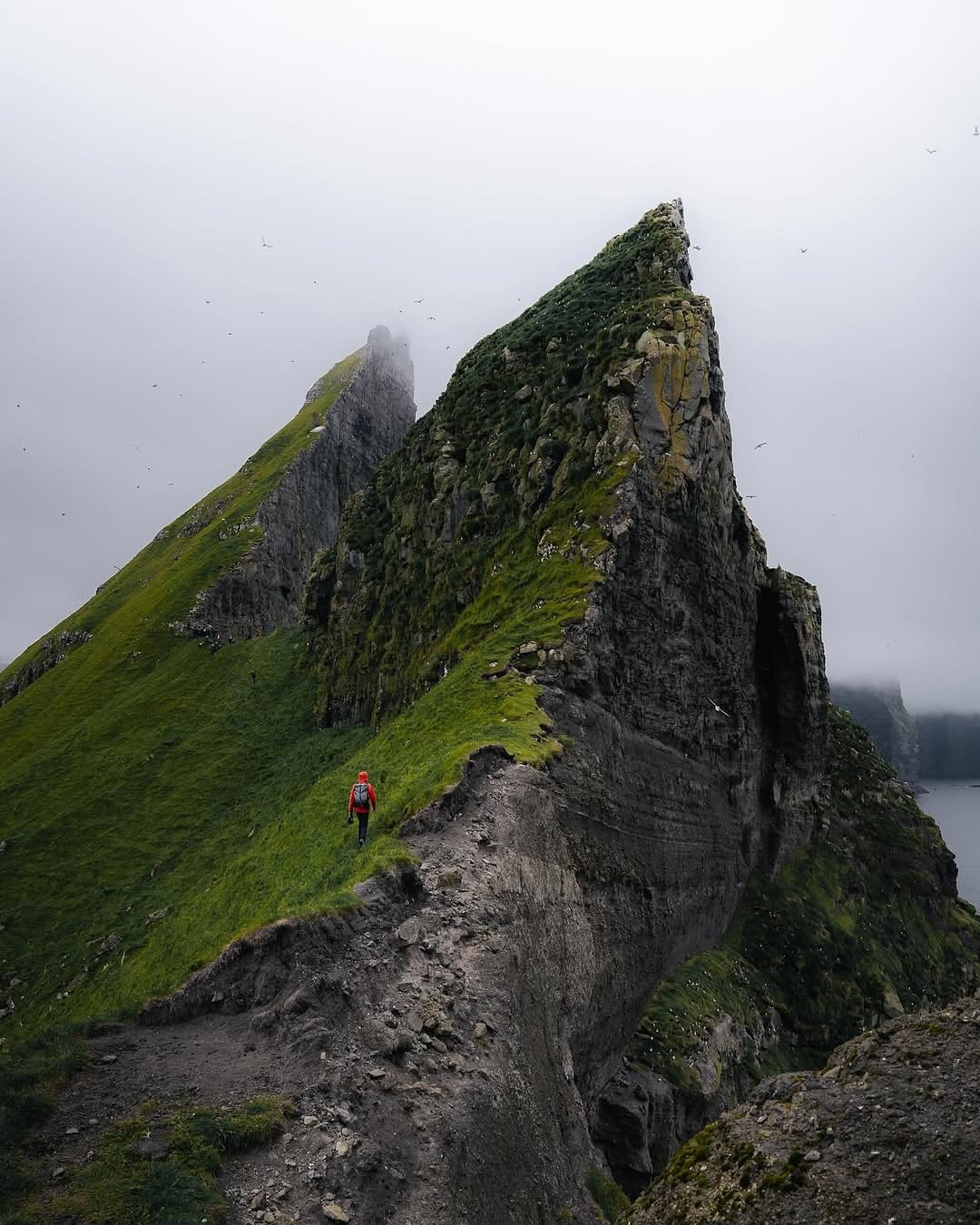 Tindh&oacute;lmur&hellip; the sleeping dragon of the Faroe Islands 🐉🇫🇴
 Now&rsquo;s your chance to set foot on one of the most iconic islets in the Faroes.

I&rsquo;ve been lucky enough to visit Tindh&oacute;lmur twice, and both times I was comple