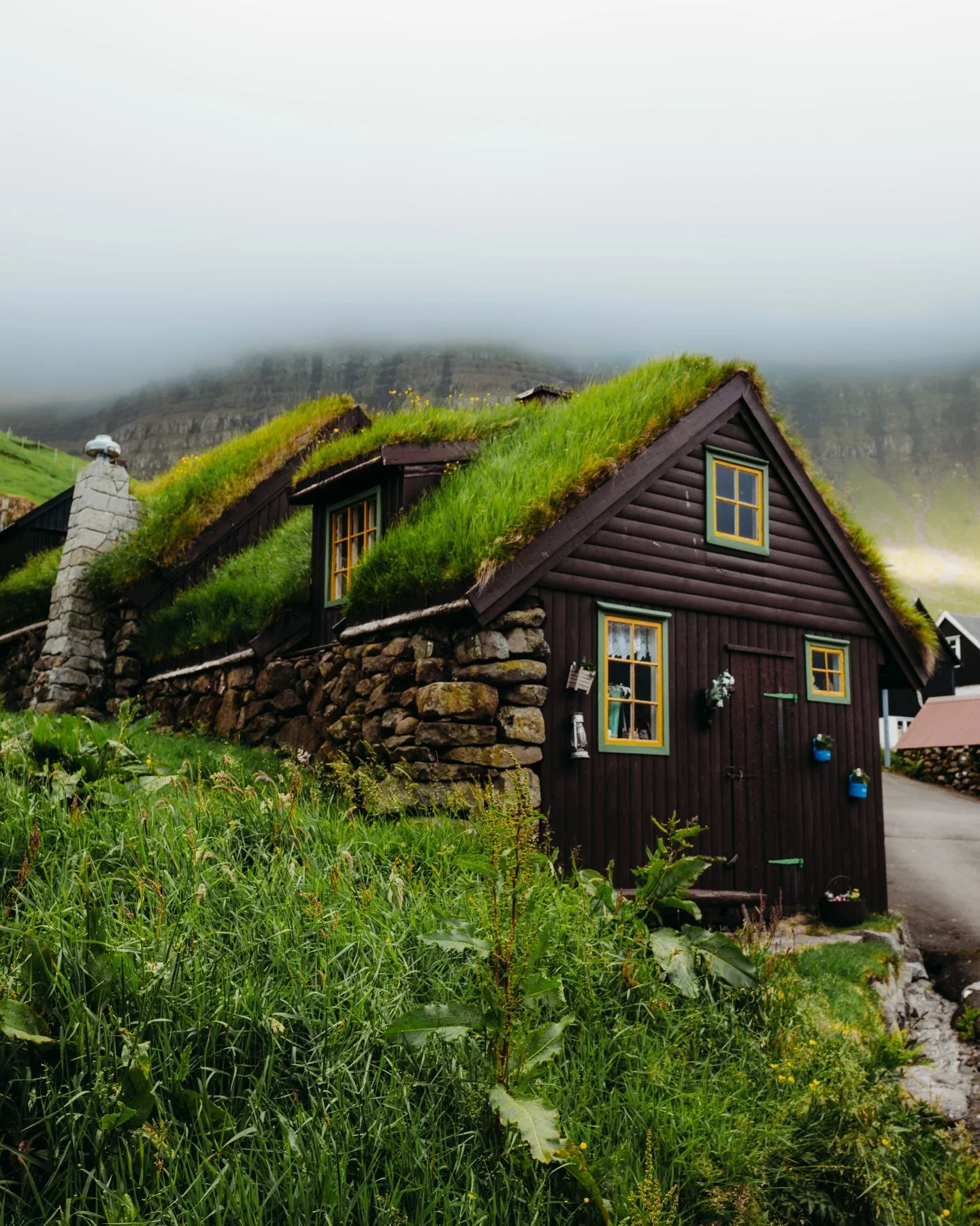 Some places feel like they belong in a fairytale 🧚

This turf house is one of them🌿

#faroeislands #nordichomes #cinematicplaces