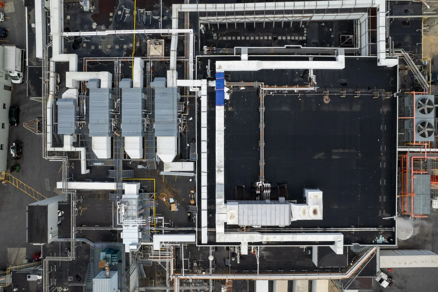 Overhead view of the processing facility roof and its air units