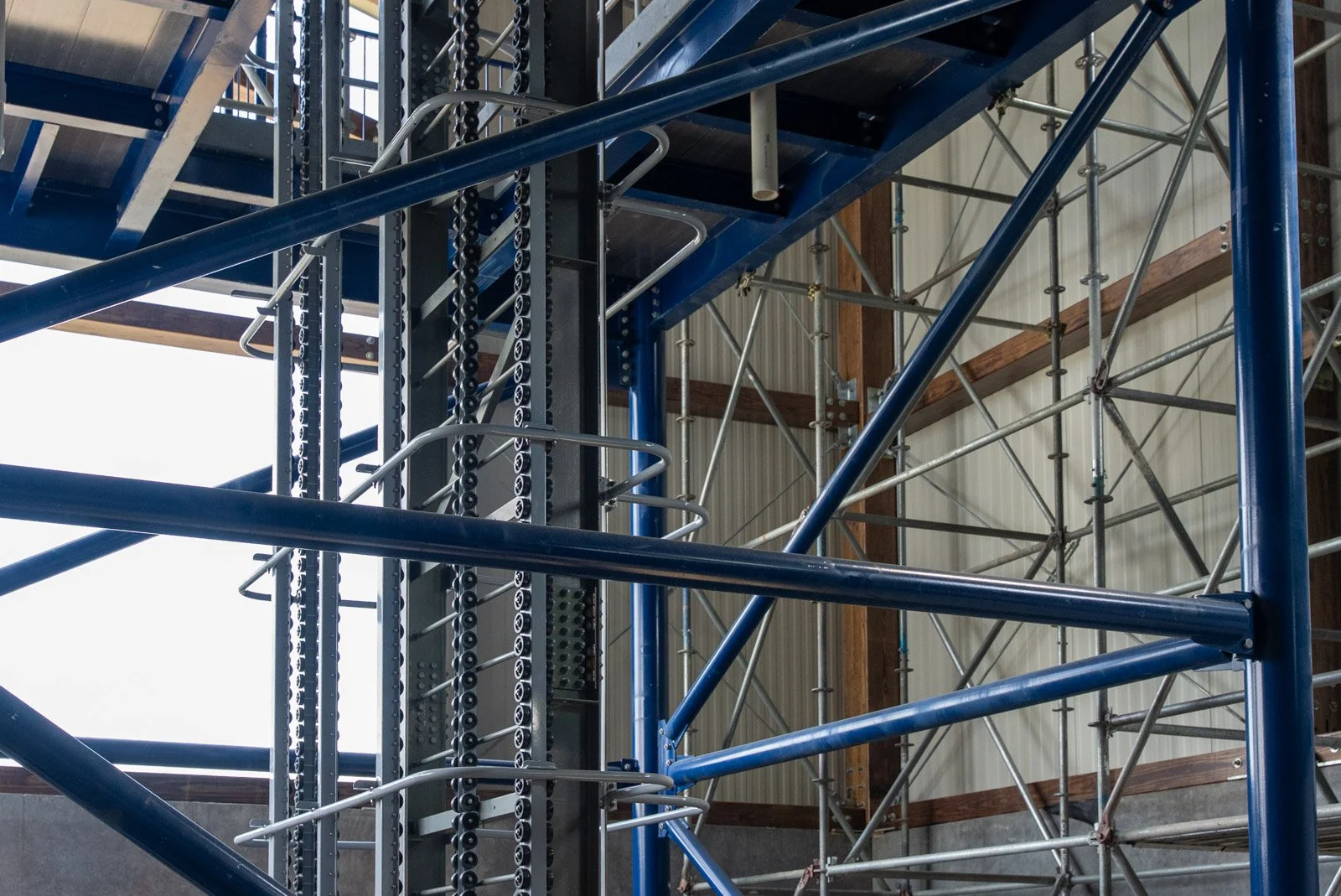 Structural steel framing and scaffolding supporting the insulated metal panel enclosure at Massanutten Water Park