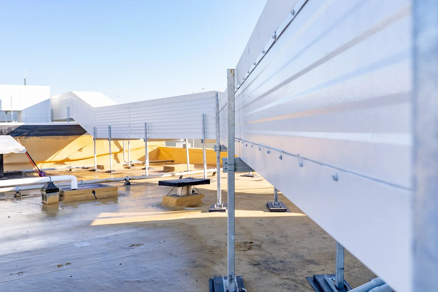 Rooftop insulated metal panel ductwork on a food processing plant