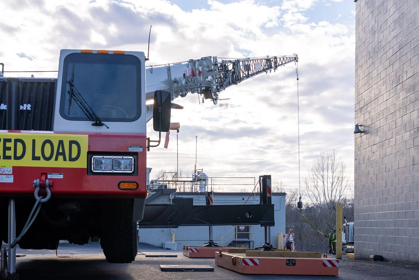 Truck with crane on top.