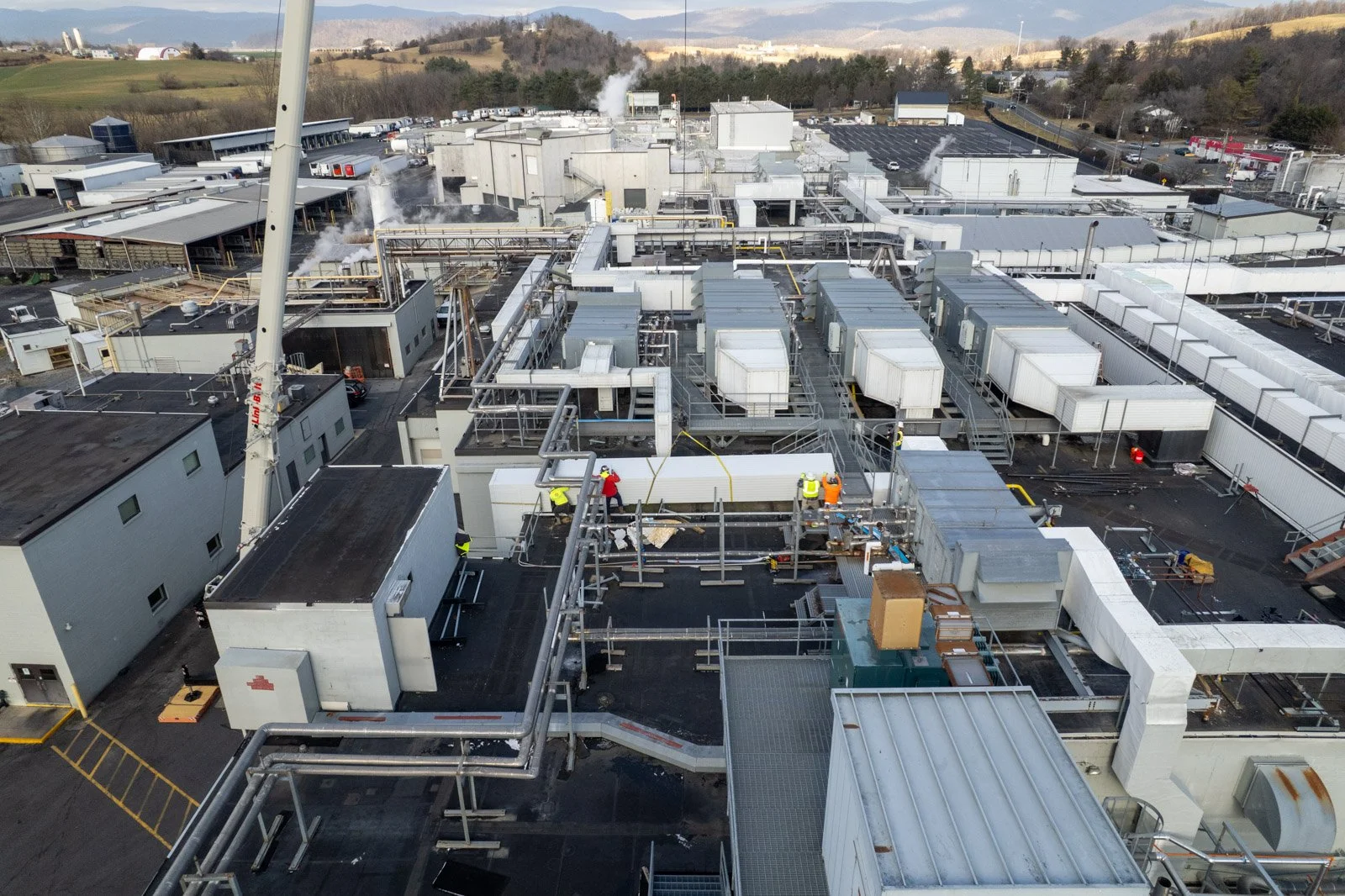 Rooftop with lots of pipes.