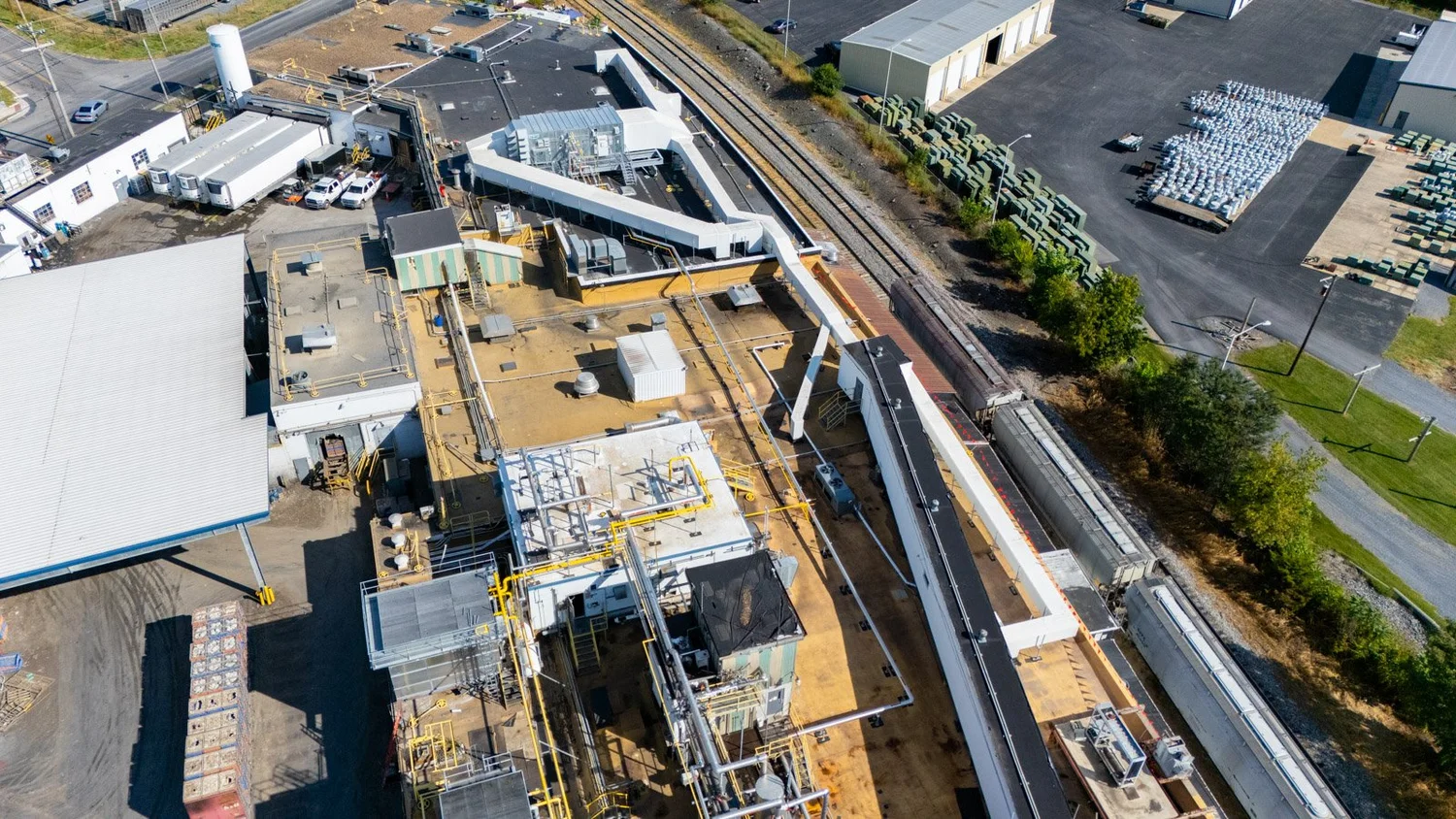 Aerial view of an industrial food processing plant and its rooftop ductwork