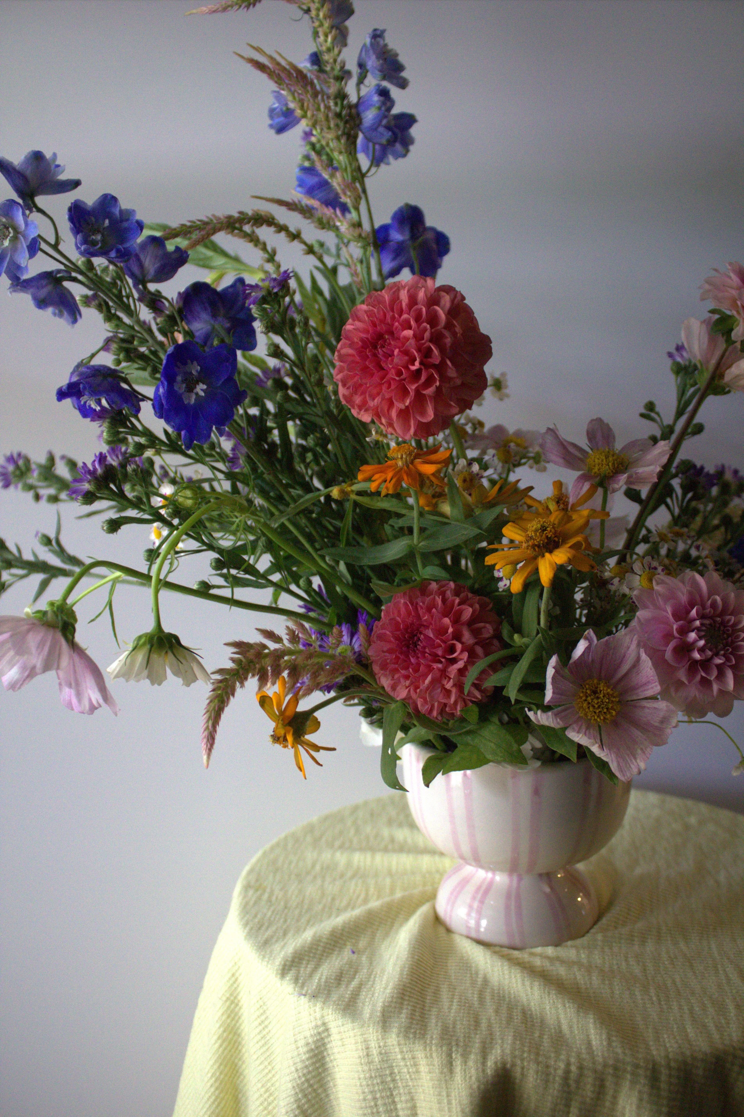 Artful floral arrangement by San Angelo florist Dahlias & Daisies