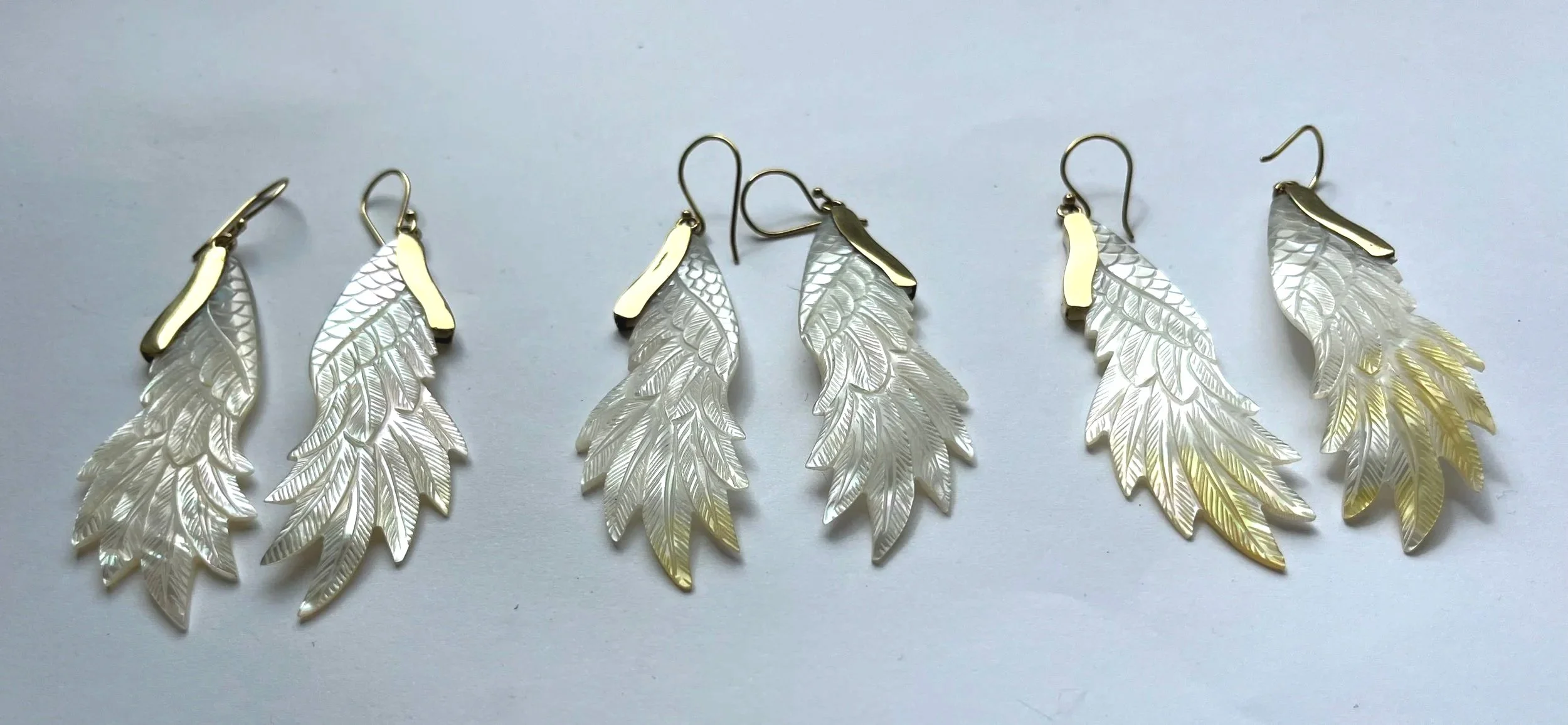 Mother of Pearl feather earrings - ethical jewellery handmade by our beautiful Baliness family artisans.