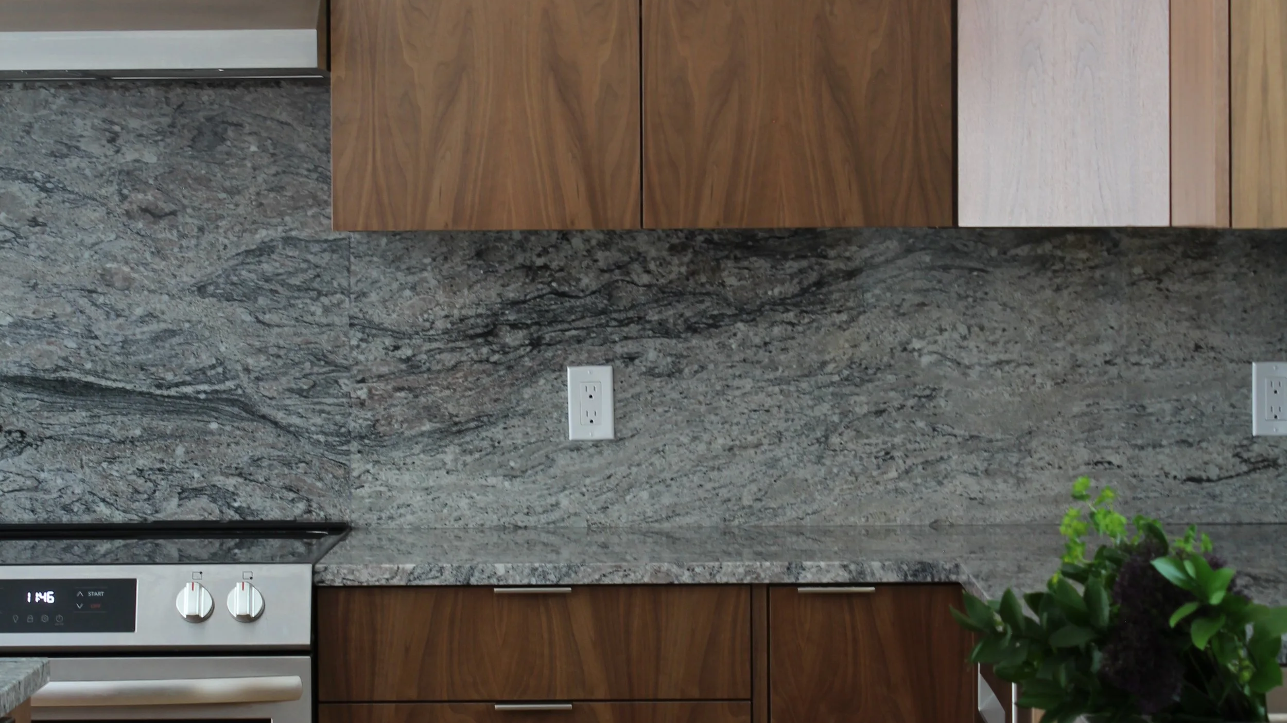 Detail of custom cabinetry in neutral tones, designed for a full home renovation in Massachusetts.