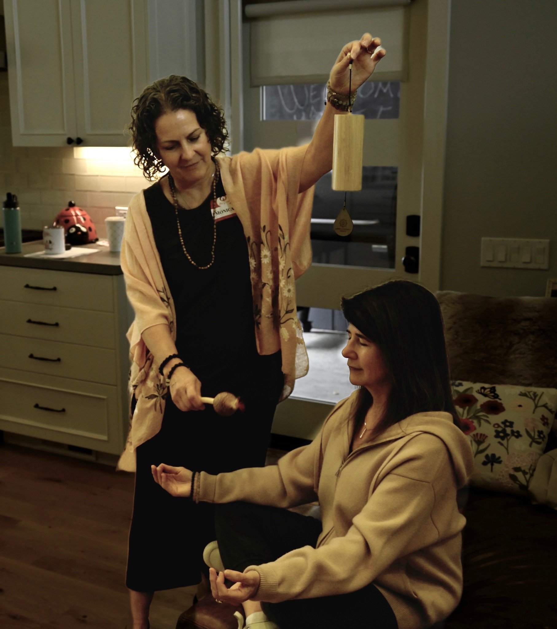 Monica Chimes & rattle with Gigi.JPG