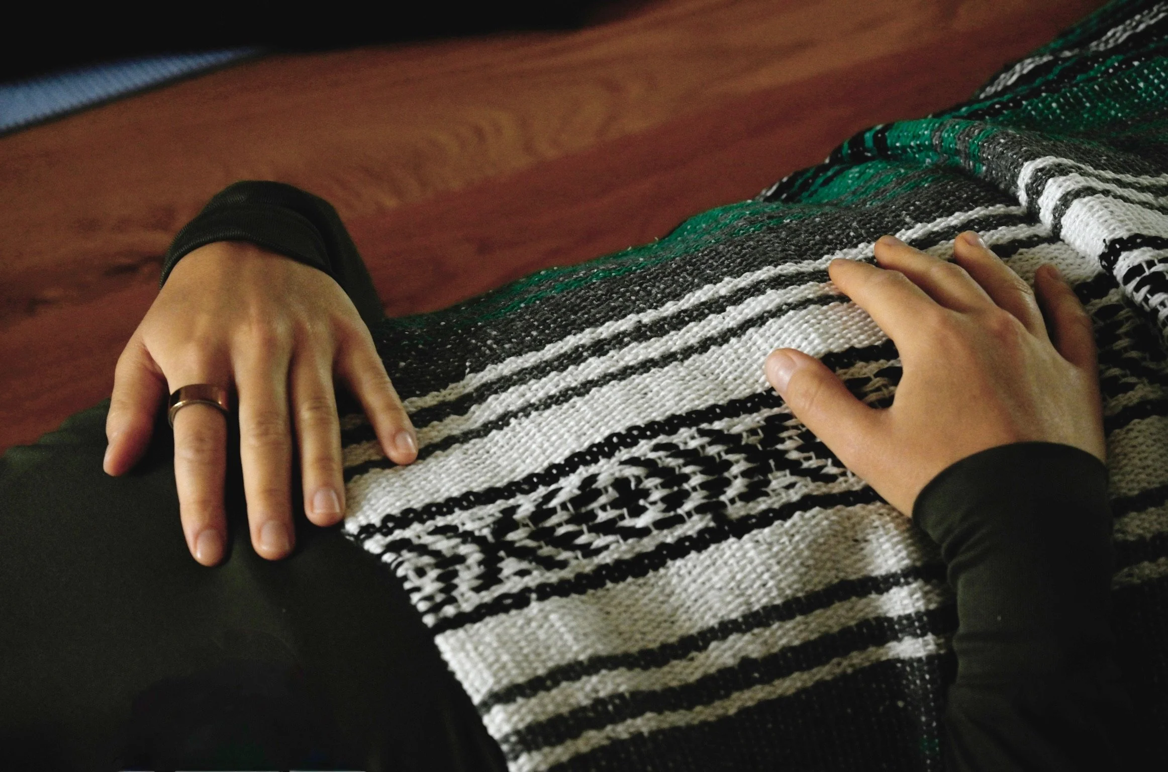 Beauty Shot of hands on a blanket.JPG