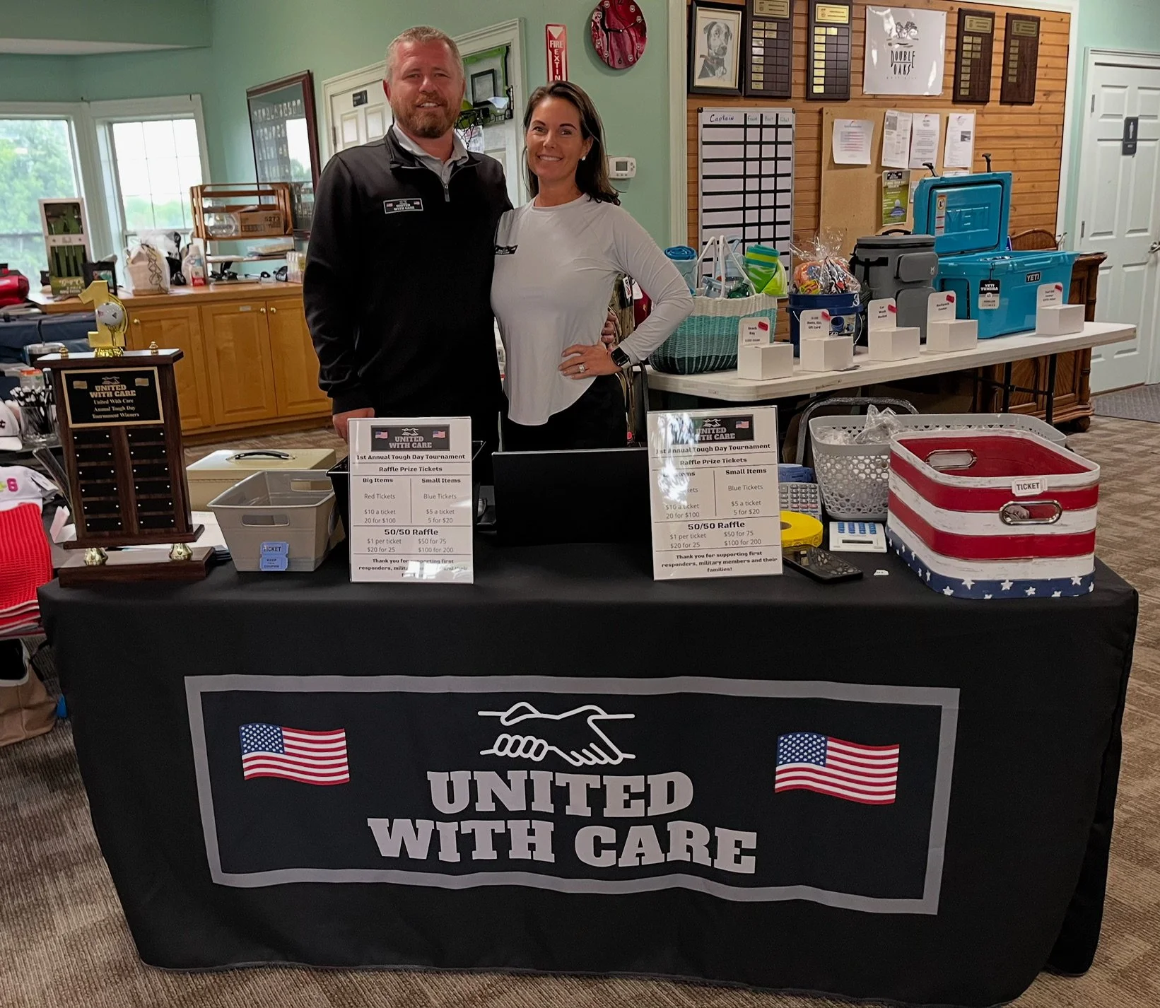 Founders of United With Care pictured at a community golf tournament supporting heroes, their families, and local outreach efforts.